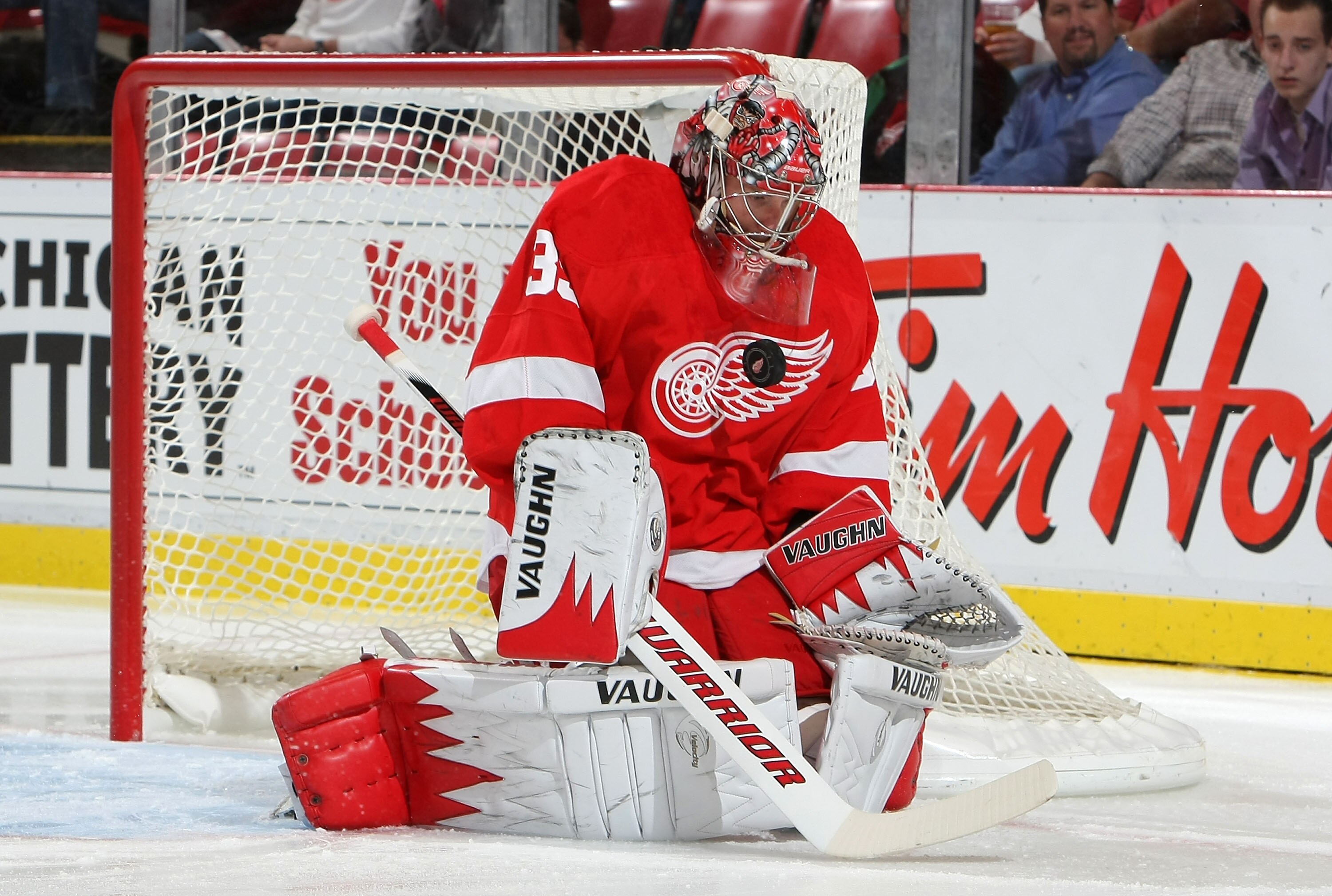 DETROIT - OCTOBER 8:  Jimmy Howard #35 of the Detroit Red Wings makes a save against the Anaheim Ducks during their NHL game at Joe Louis Arena on October 8, 2010 in Detroit, Michigan.(Photo By Dave Sandford/Getty Images)