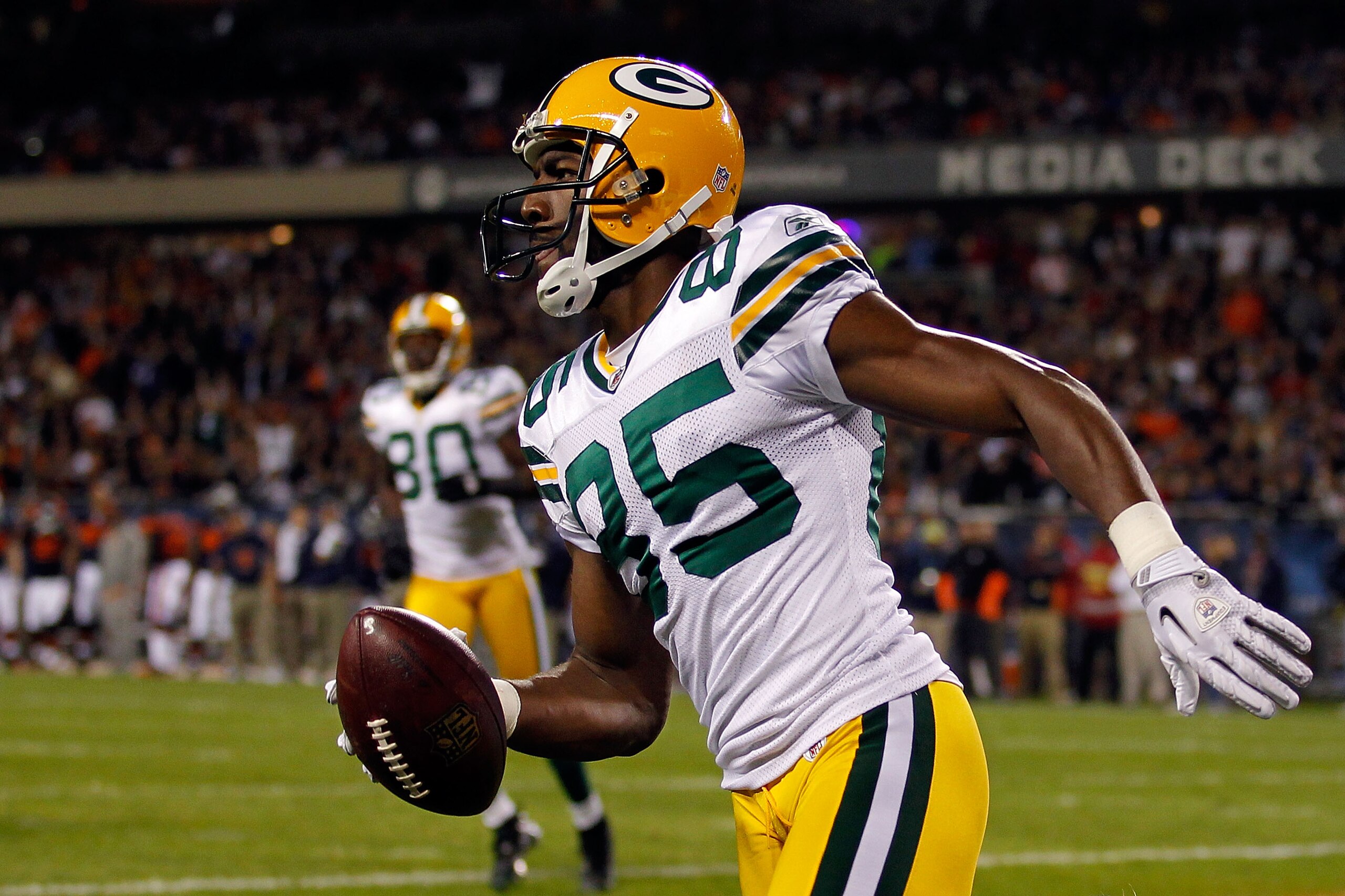CHICAGO - SEPTEMBER 27:  Greg Jennings #85 of the Green Bay Packers reacts after he scored a 7-yard touchdown reception in the first quarter against the Chicago Bears at Soldier Field on September 27, 2010 in Chicago, Illinois.  (Photo by Jonathan Daniel/