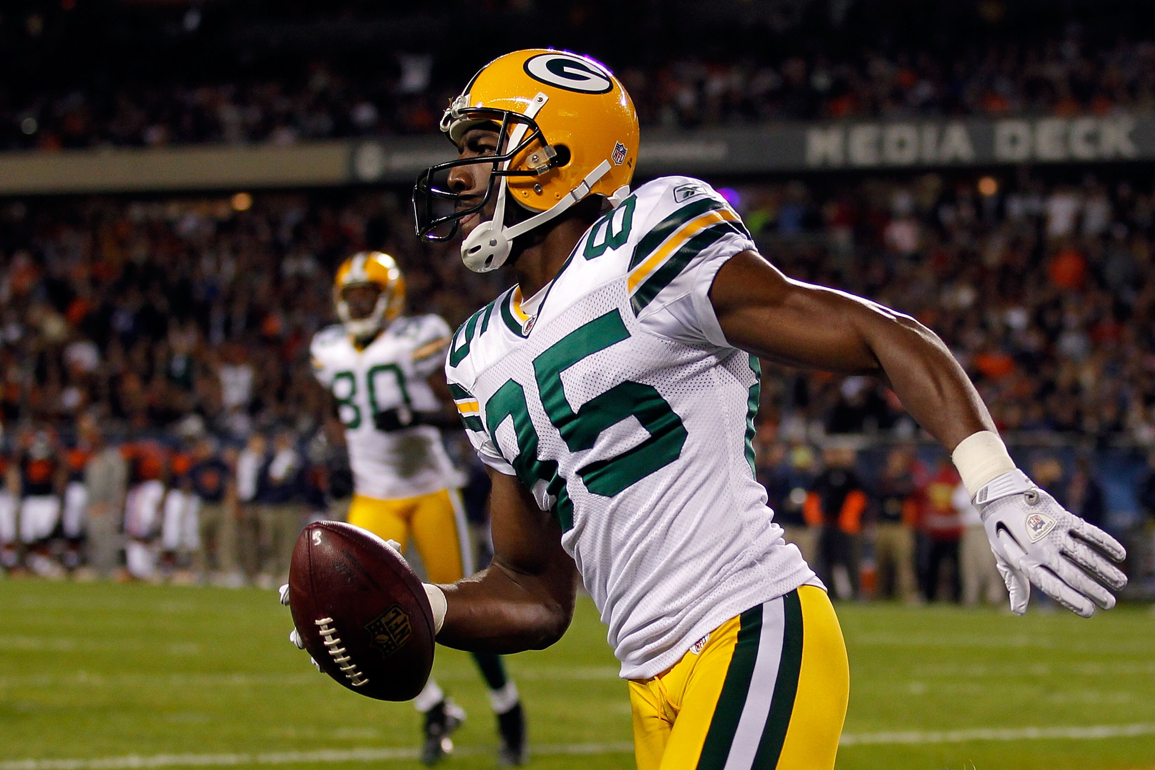 CHICAGO - SEPTEMBER 27:  Greg Jennings #85 of the Green Bay Packers reacts after he scored a 7-yard touchdown reception in the first quarter against the Chicago Bears at Soldier Field on September 27, 2010 in Chicago, Illinois.  (Photo by Jonathan Daniel/