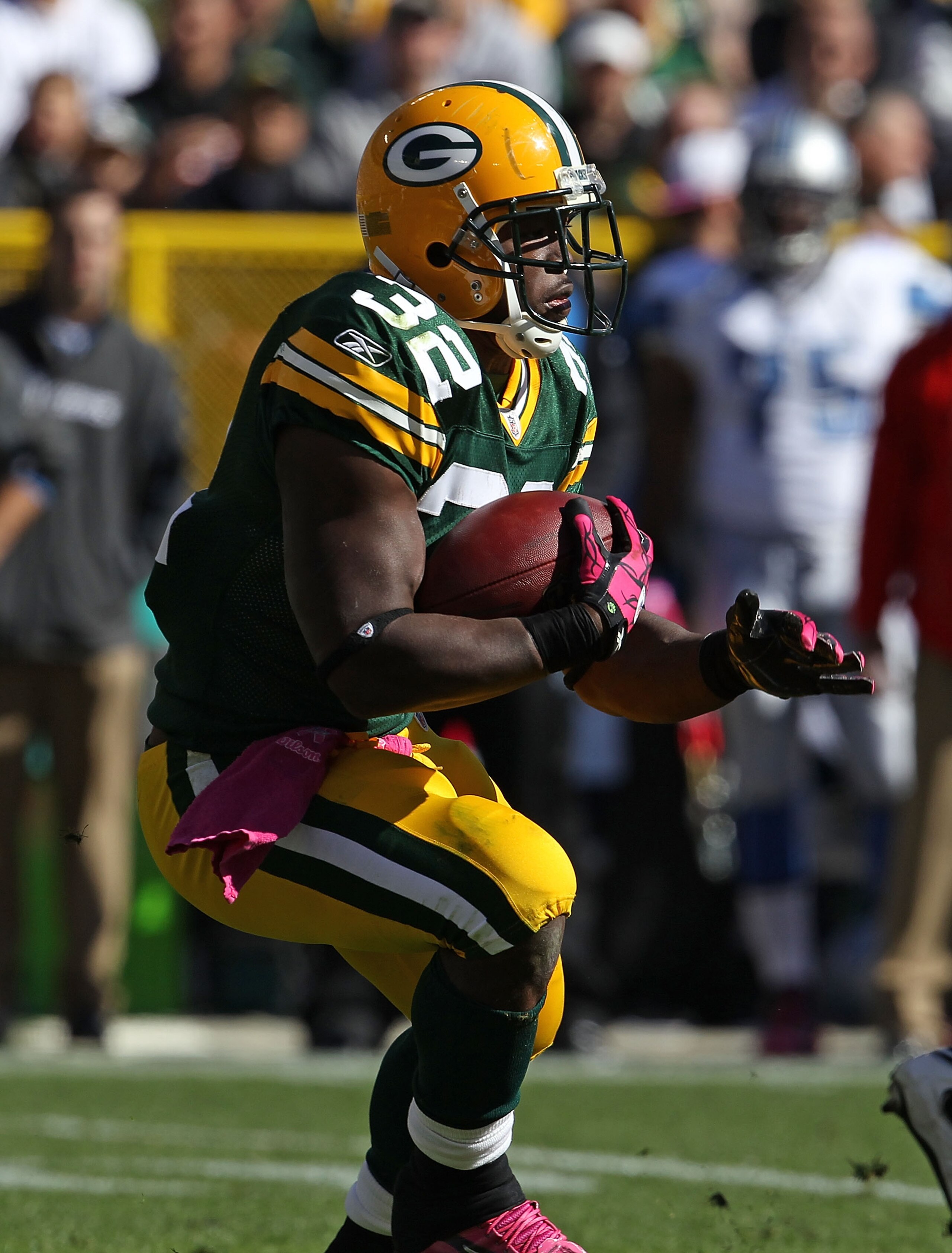 GREEN BAY, WI - OCTOBER 03: Brandon Jackson #32 of the Green Bay Packers rushes against the Detroit Lions at Lambeau Field on October 3, 2010 in Green Bay, Wisconsin. The Packers defeated the Lions 28-26. (Photo by Jonathan Daniel/Getty Images)