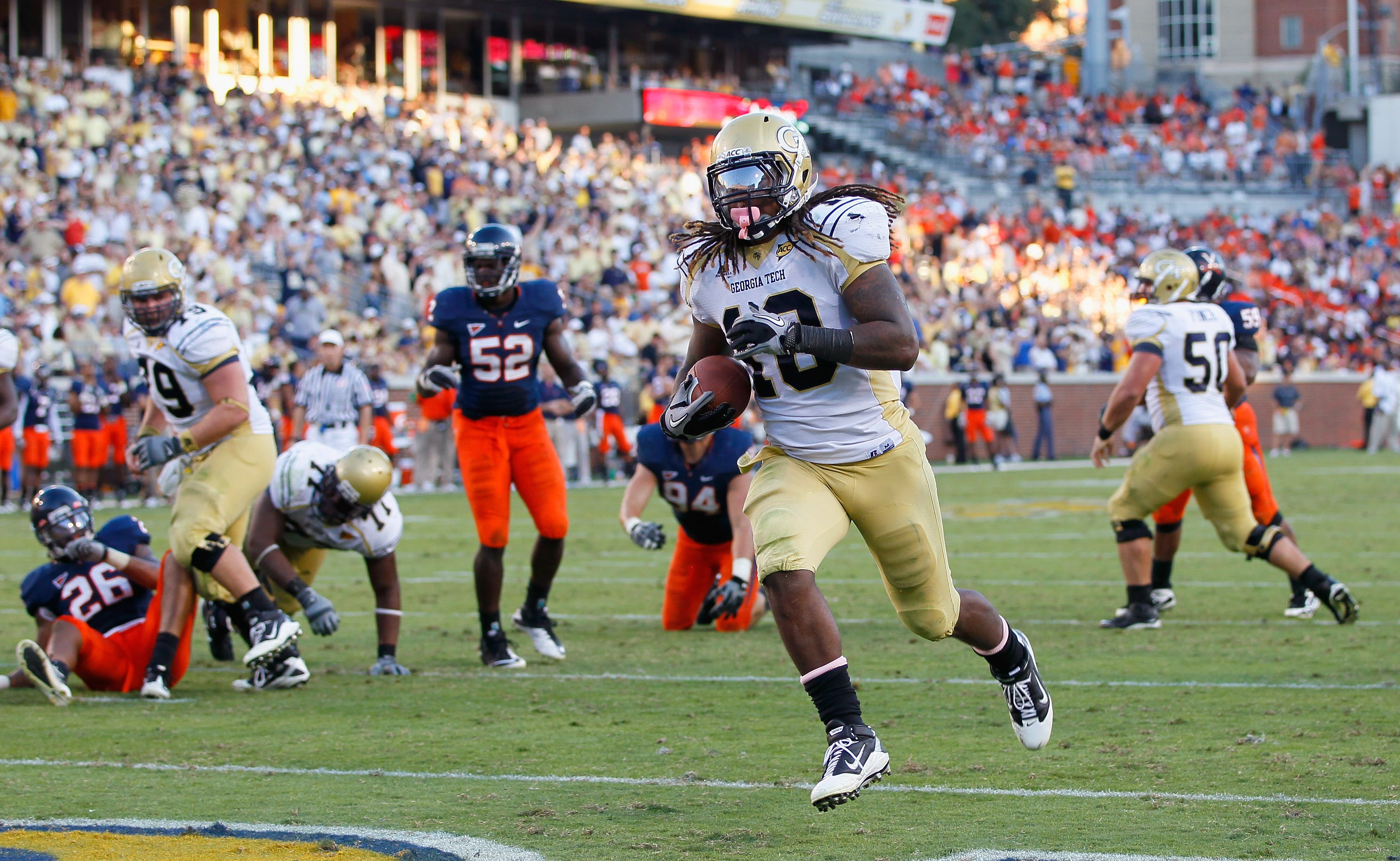ATLANTA - OCTOBER 09:  Anthony Allen #18 of the Georgia Tech Yellow Jackets rushes for a touchdown against the Virginia Cavaliers at Bobby Dodd Stadium on October 9, 2010 in Atlanta, Georgia.  (Photo by Kevin C. Cox/Getty Images)