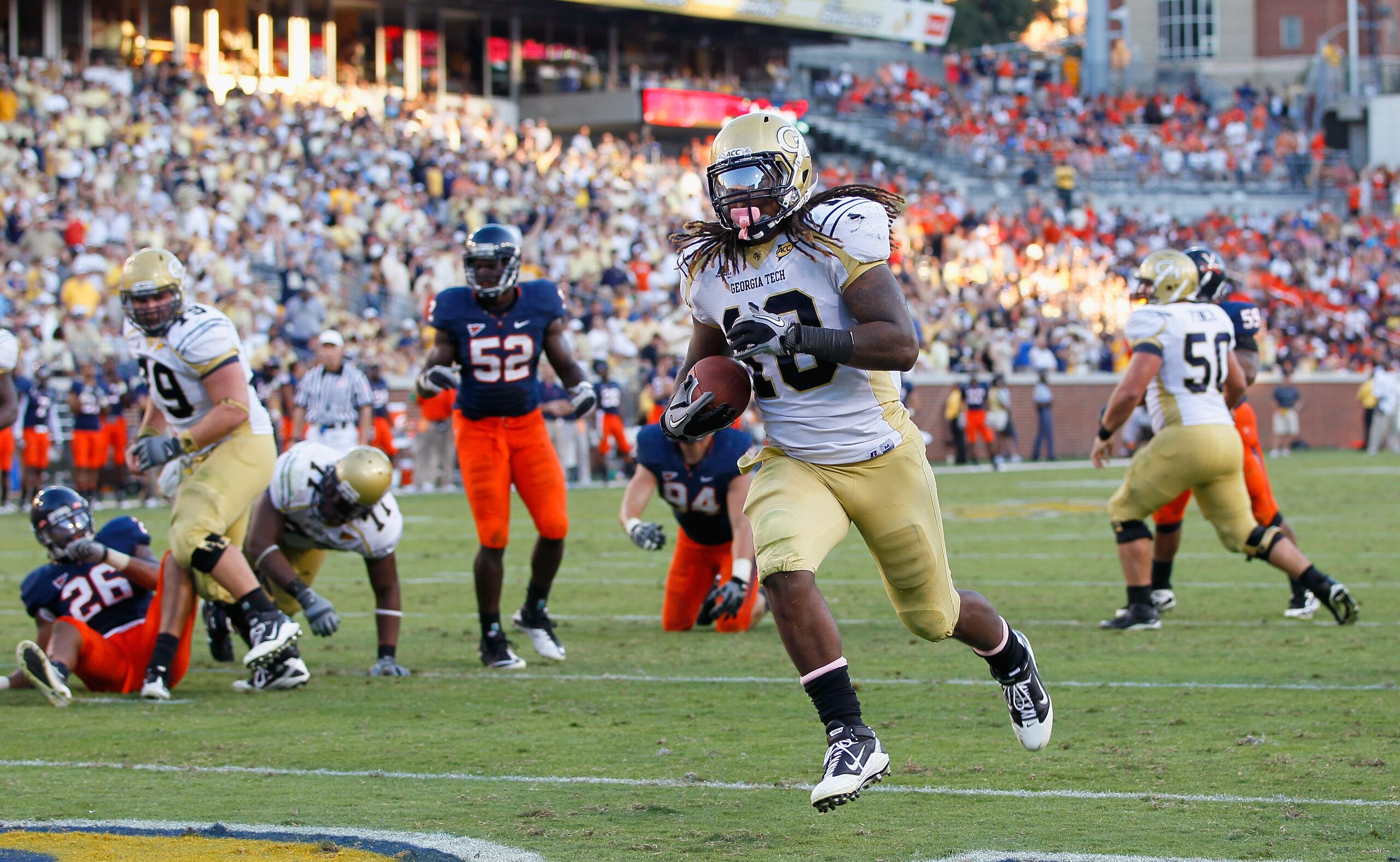 ATLANTA - OCTOBER 09:  Anthony Allen #18 of the Georgia Tech Yellow Jackets rushes for a touchdown against the Virginia Cavaliers at Bobby Dodd Stadium on October 9, 2010 in Atlanta, Georgia.  (Photo by Kevin C. Cox/Getty Images)