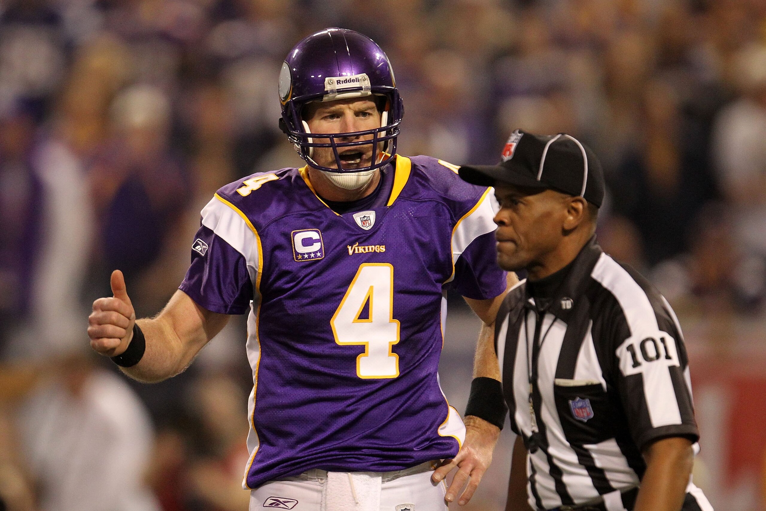 MINNEAPOLIS - JANUARY 17:  Quarterback Brett Favre #4 of the Minnesota Vikings reacts to a call while playing against the Dallas Cowboys during the NFC Divisional Playoff Game at Hubert H. Humphrey Metrodome on January 17, 2010 in Minneapolis, Minnesota.