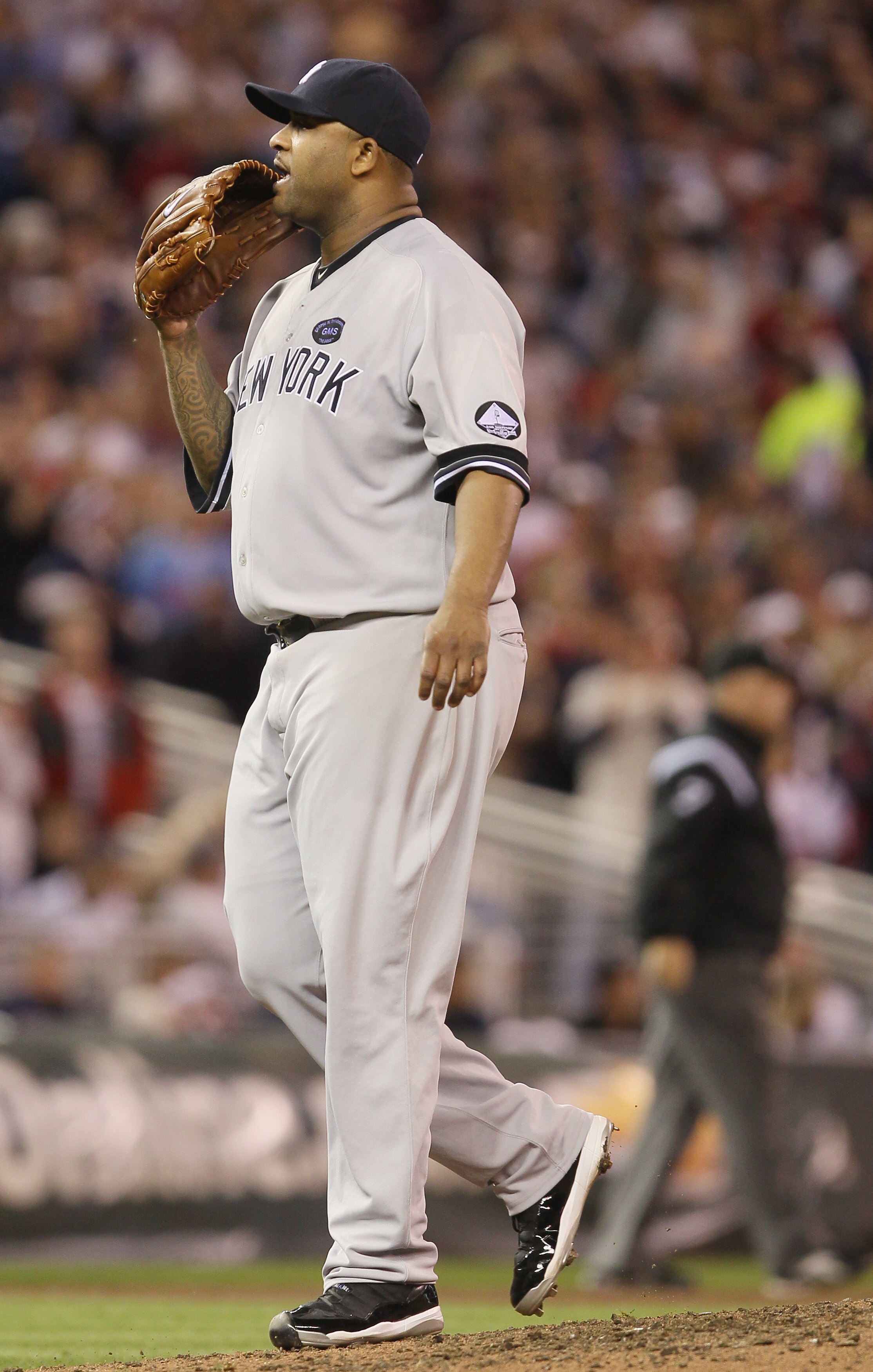 MINNEAPOLIS - OCTOBER 06: CC Sabathia #52 of the New York Yankees signals to Jorge Posada in the sixth inning against the Minnesota Twins during game one of the ALDS on October 6, 2010 at Target Field in Minneapolis, Minnesota.  (Photo by Elsa/Getty Image