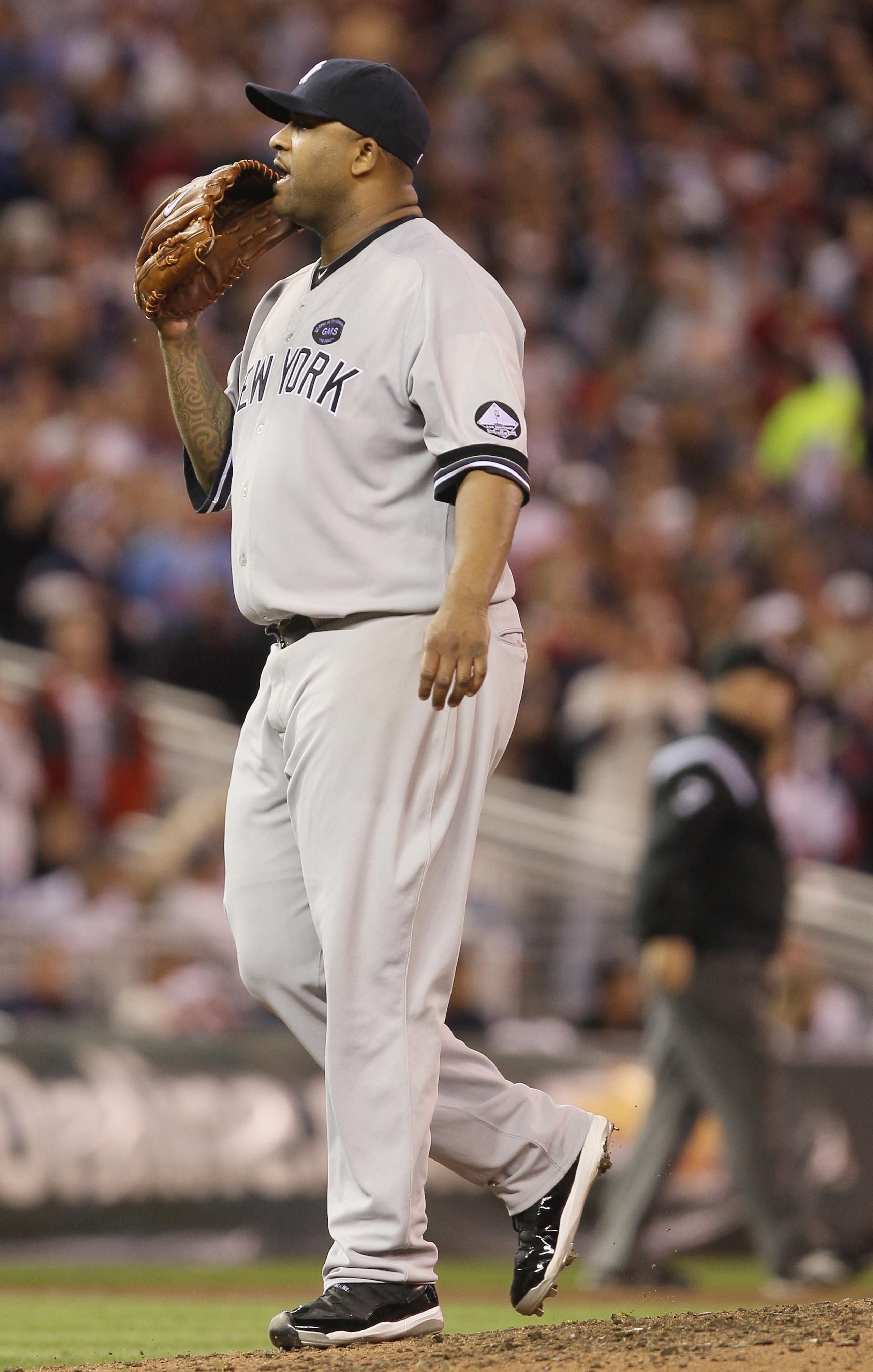 MINNEAPOLIS - OCTOBER 06: CC Sabathia #52 of the New York Yankees signals to Jorge Posada in the sixth inning against the Minnesota Twins during game one of the ALDS on October 6, 2010 at Target Field in Minneapolis, Minnesota.  (Photo by Elsa/Getty Image