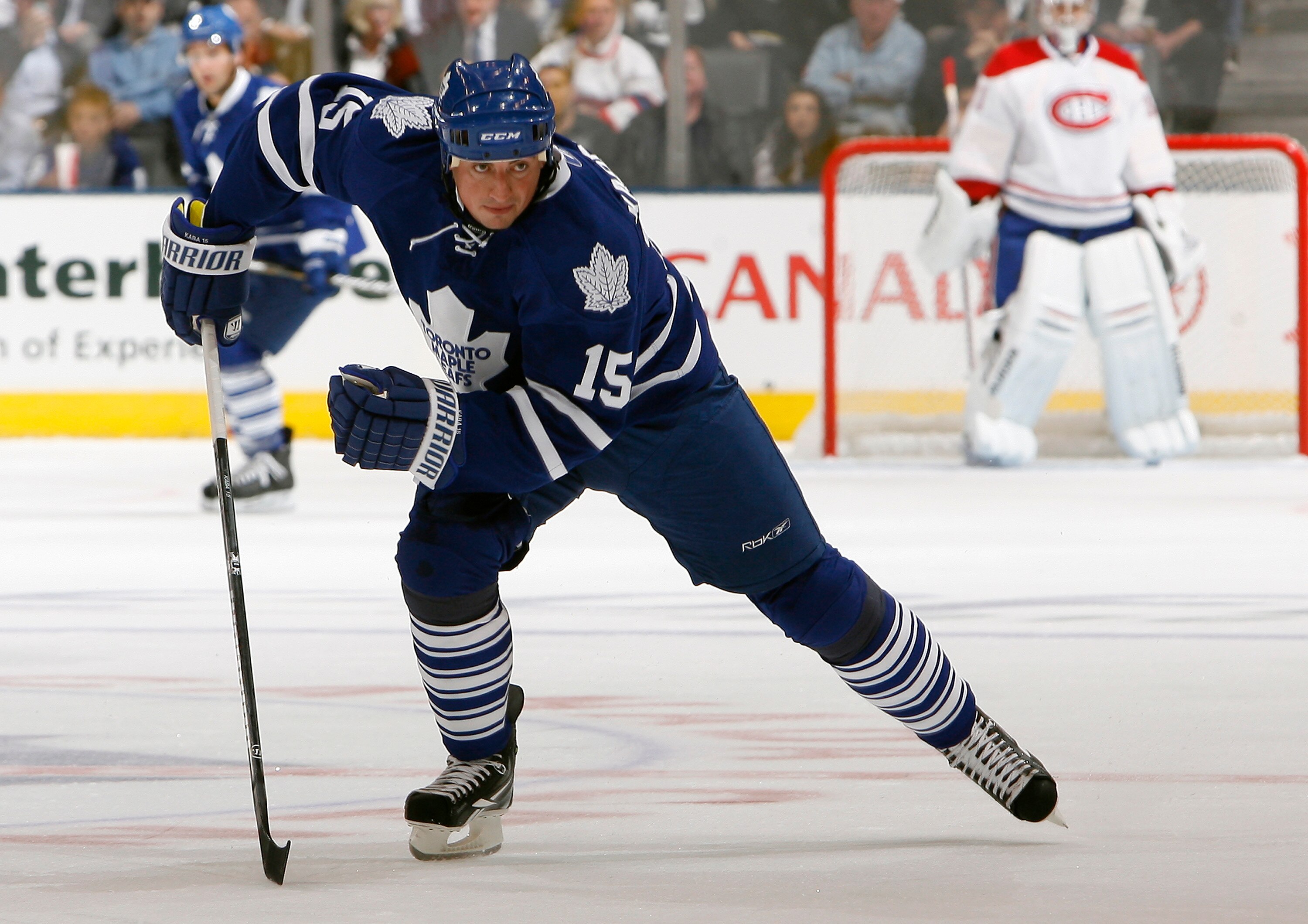 TORONTO, CANADA - OCTOBER 07: Tomas Kaberle #15 of the Toronto Maple Leafs skates up the ice during a regular season NHL game against the Montreal Canadiens at the Air Canada Centre October 7, 2010 in Toronto, Ontario, Canada. (Photo by Abelimages/Getty I