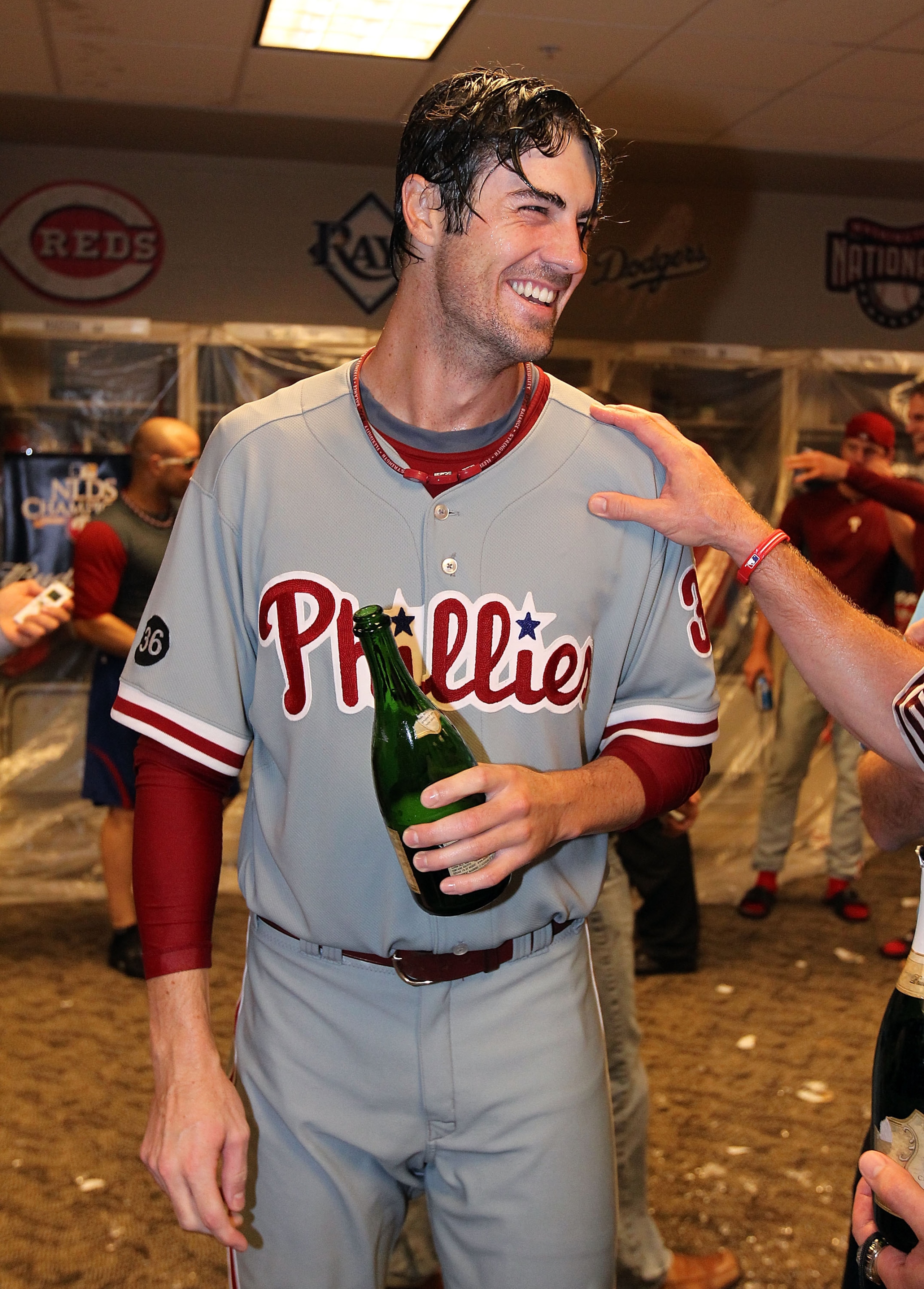 CINCINNATI - OCTOBER 10: Cole Hamels #35 of the Philadelphia Phillies celebrates in the clubhouse after throwing a complete game shut-out to sweep the Cincinnati Reds during Game 3 of the NLDS at Great American Ball Park on October 10, 2010 in Cincinnati CINCINNATI - OCTOBER 10: Cole Hamels #35 of the Philadelphia Phillies celebrates in the clubhouse after throwing a complete game shut-out to sweep the Cincinnati Reds during Game 3 of the NLDS at Great American Ball Park on October 10, 2010 in Cincinnati