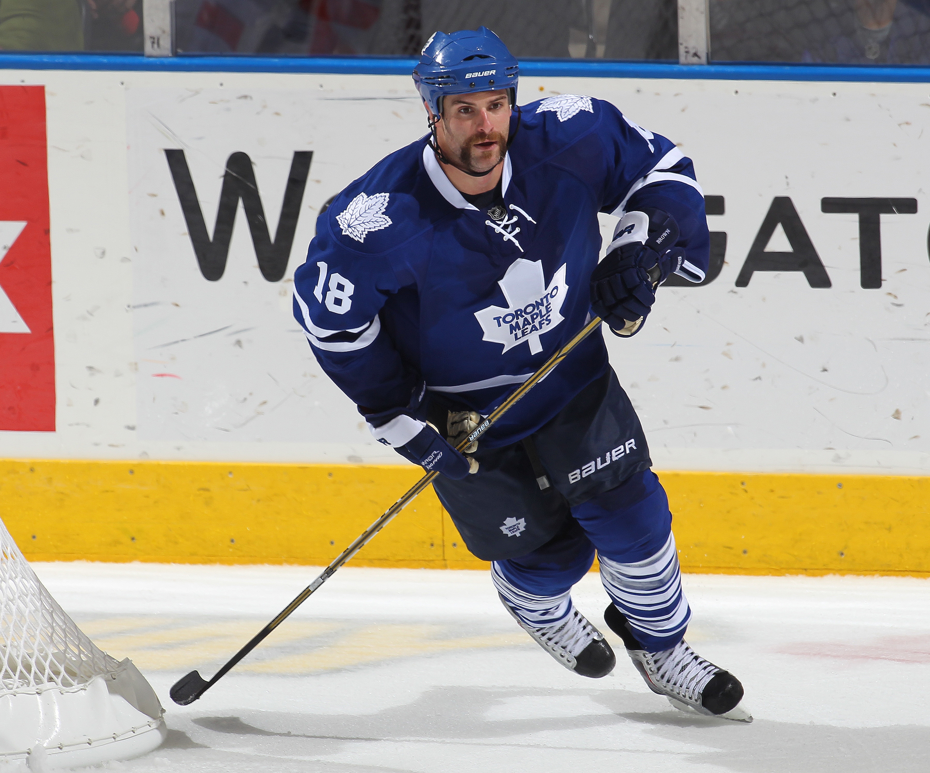 LONDON,ON - SEPTEMBER 23: Mike Brown #18 of the Toronto Maple Leafs skates in a pre-season game against the Philadelphia Flyers on September 23,2010 at the John Labatt Centre in London, Ontario. The Leafs defeated the Flyers 3-2 in a shoot-out. (Photo by