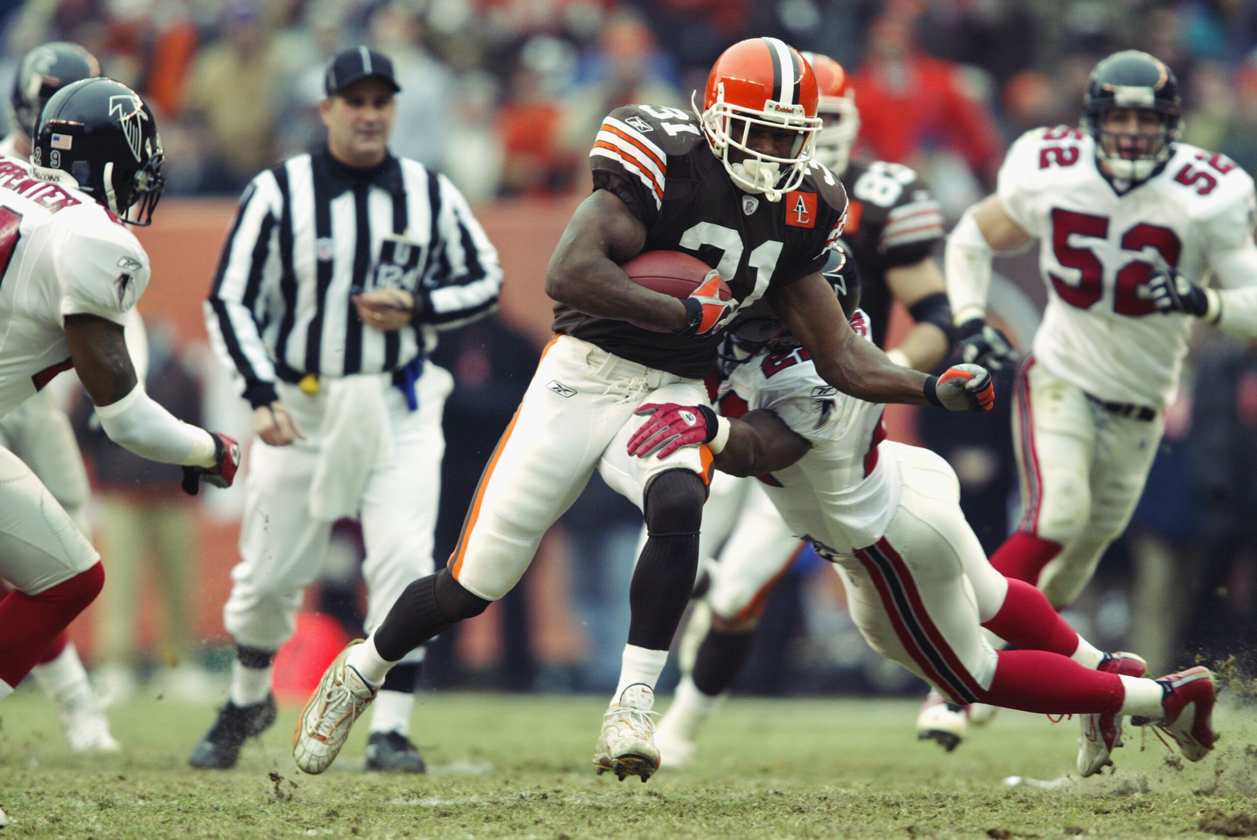 CLEVELAND - DECEMBER 29:  Running back William Green #31 of the Cleveland Browns carries the ball against the Atlanta Falcons during the NFL game at Cleveland Browns Stadium on December 29, 2002 in Cleveland, Ohio.  The Browns defeated the Falcons 24-16. 