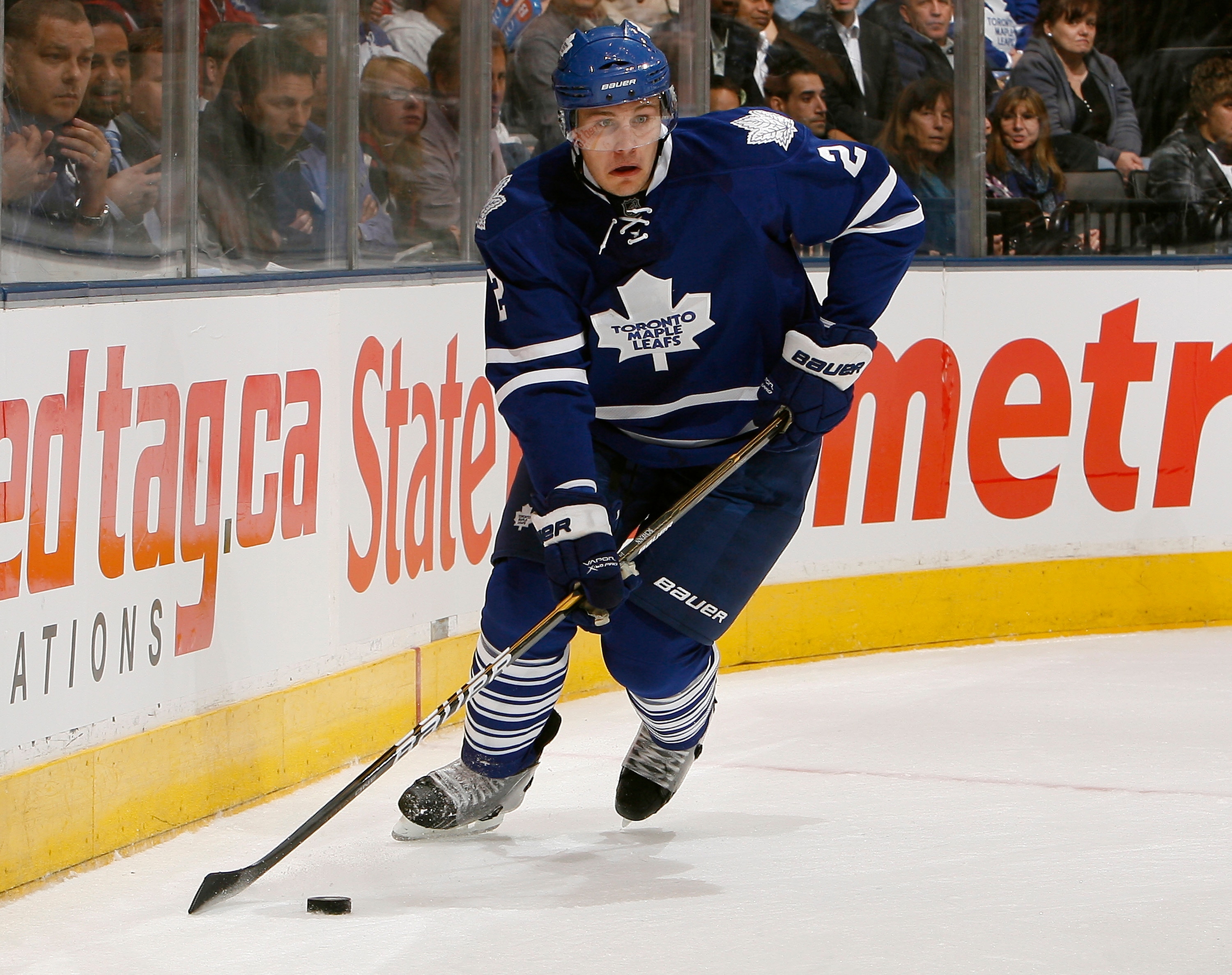 TORONTO, CANADA - OCTOBER 07: Luke Schenn #2 of the Toronto Maple Leafs carries the puck during a regular season NHL game against the Montreal Canadiens at the Air Canada Centre October 7, 2010 in Toronto, Ontario, Canada. (Photo by Abelimages/Getty Image