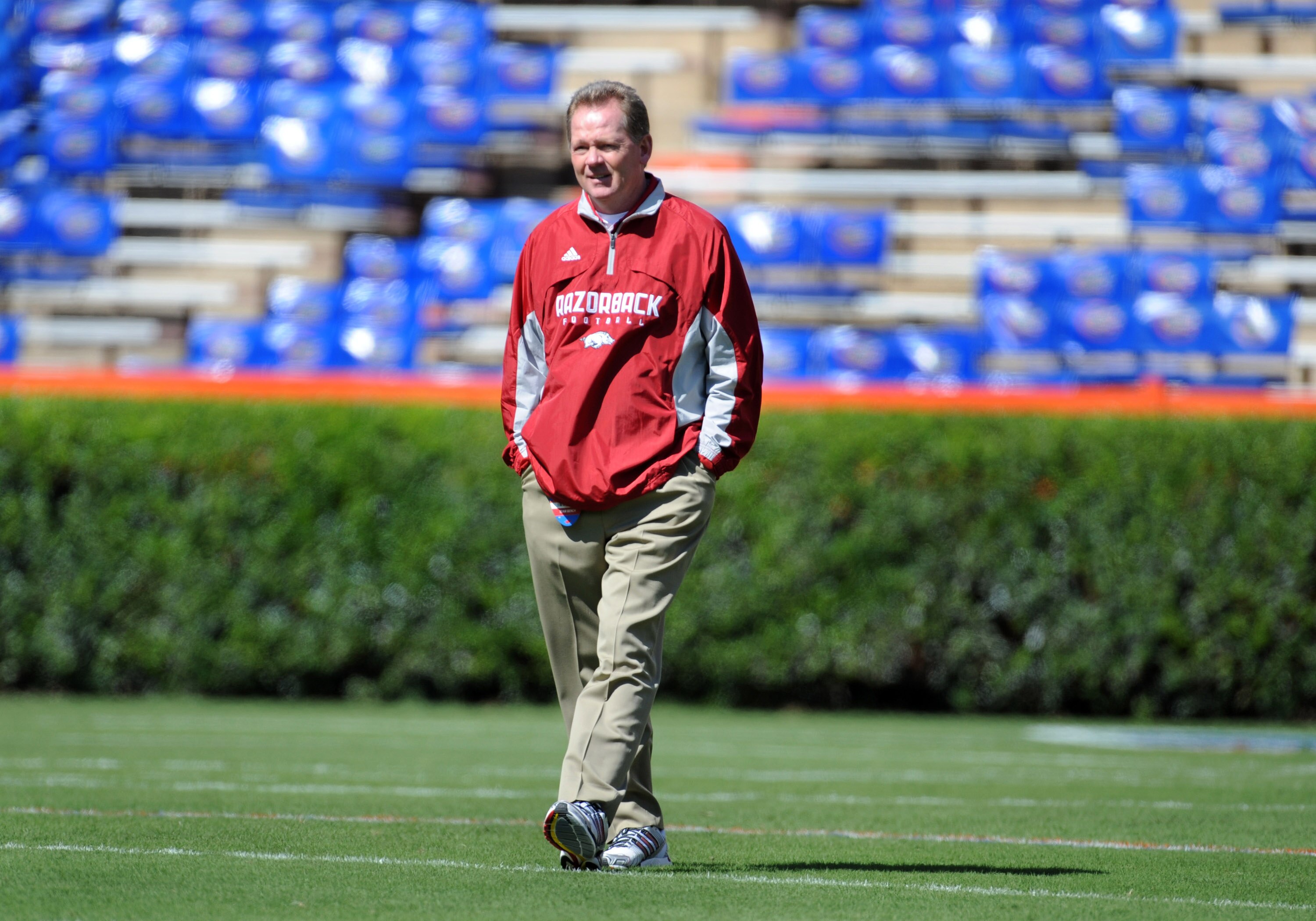 GAINESVILLE, FL - OCTOBER 17: Coach Bobby Petrino of the Arkansas Razorbacks walks the field before play against the Florida Gators October 17, 2009 at Ben Hill Griffin Stadium in Gainesville, Florida.  (Photo by Al Messerschmidt/Getty Images)