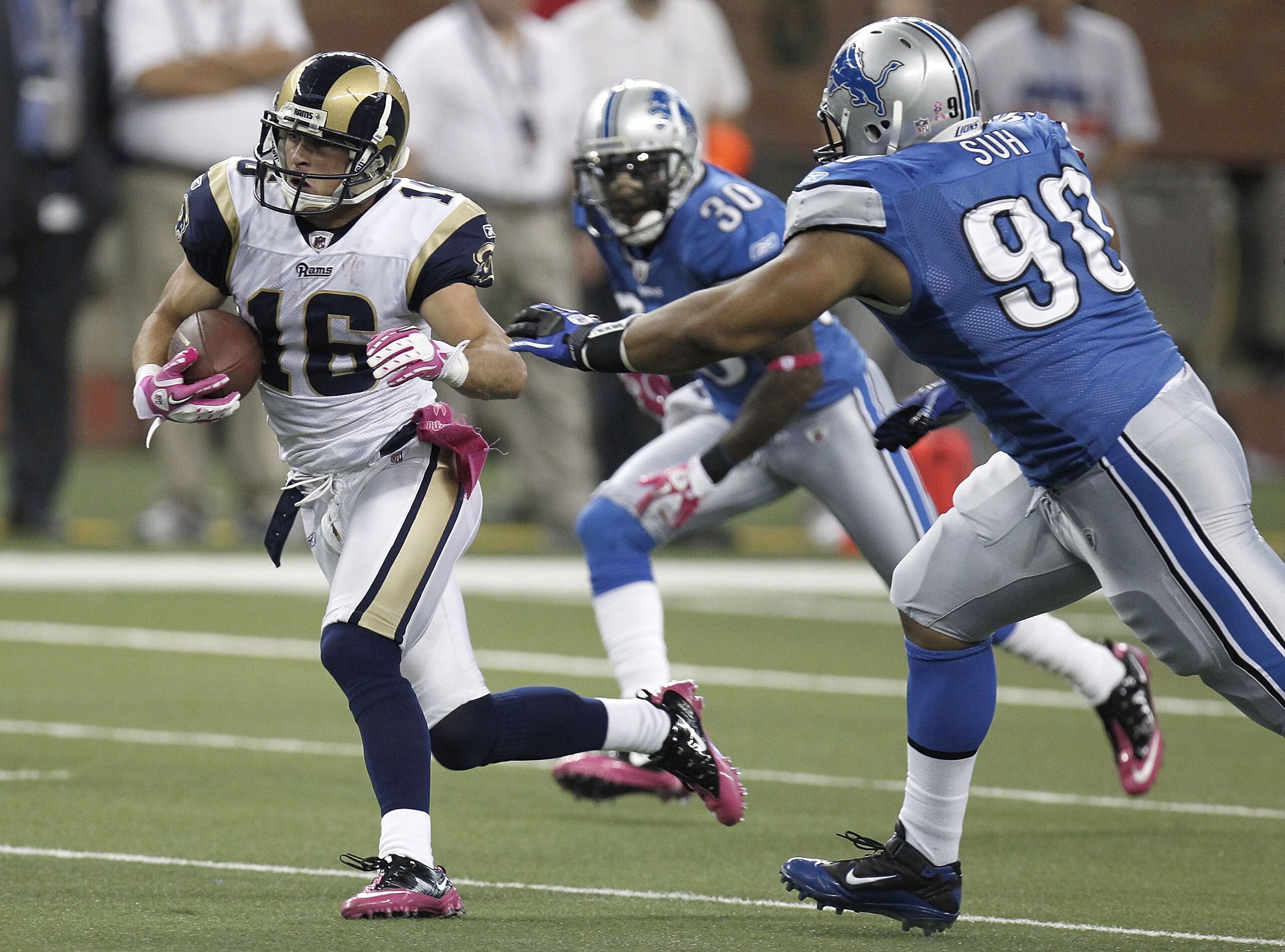 DETROIT - OCTOBER 10: Danny Amendola #16 of the St. Louis Rams tries to outrun the tackle of Ndamukong Suh #90 of the Detroit Lions on October 10, 2010 at Ford Field in Detroit, Michigan.  (Photo by Gregory Shamus/Getty Images)