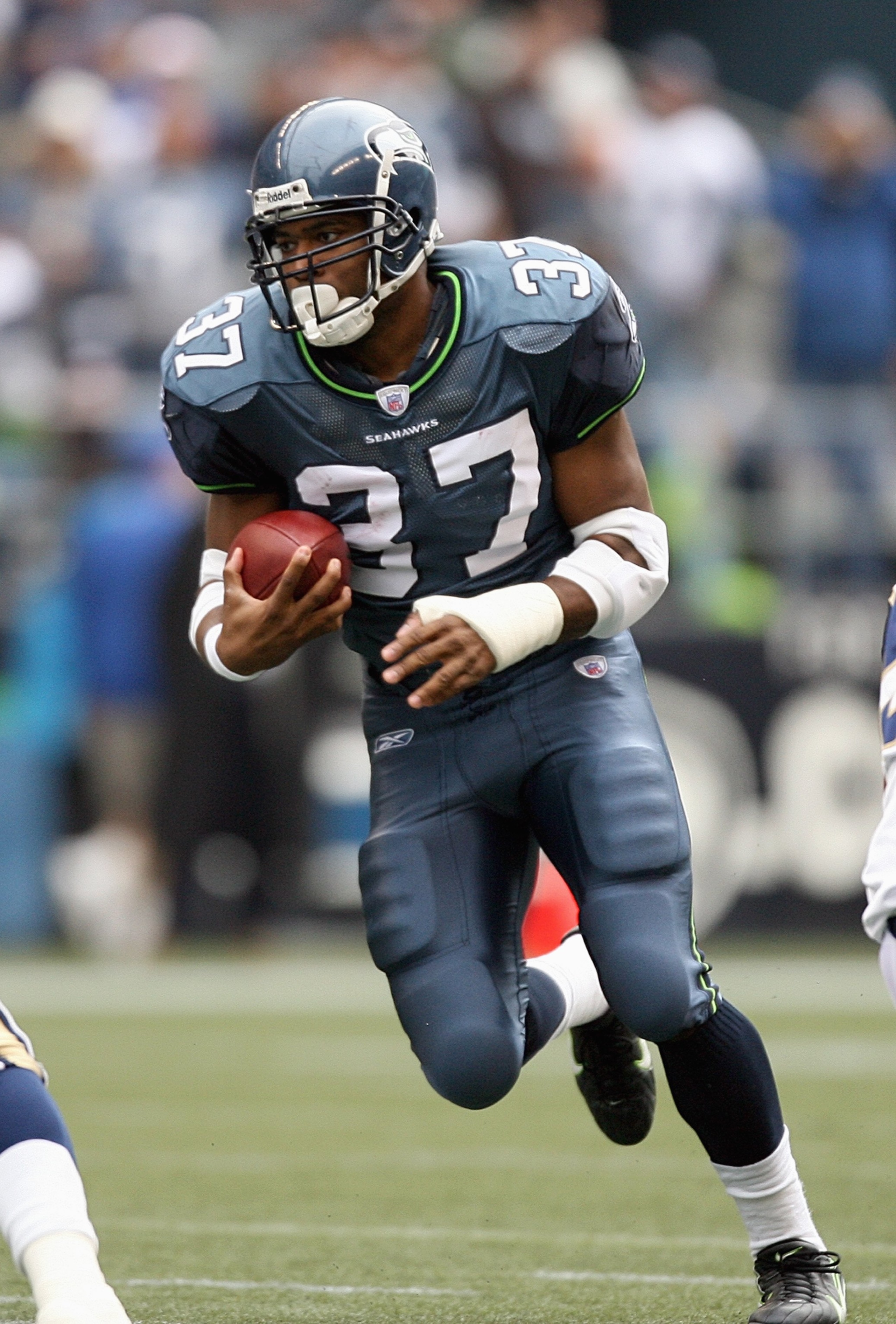 SEATTLE - OCTOBER 21: Shaun Alexander #37 of the Seattle Seahawks carries the ball during the game against the St. Louis Rams at Qwest Field on October 21, 2007 in Seattle, Washington. (Photo by Otto Greule Jr/Getty Images)