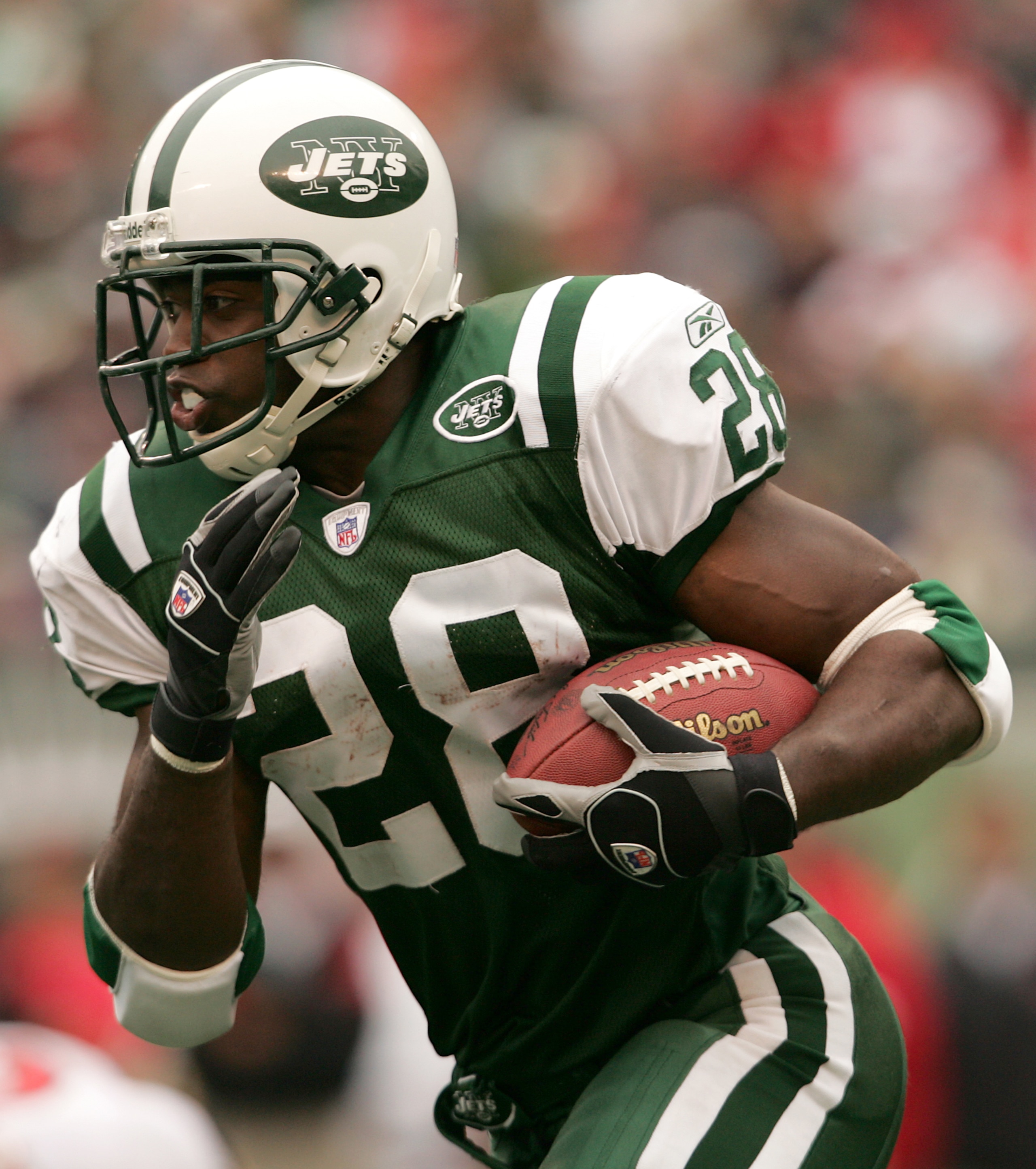 EAST RUTHERFORD, NJ - OCTOBER 9: Curtis Martin #28 of the New York Jets takes the ball forward against the Tampa Bay Buccaneers on October 9, 2005 at Giants Stadium in East Rutherford, New Jersey. The Jets defeated the Buccaneers 14-12. (Photo by Nick Lah