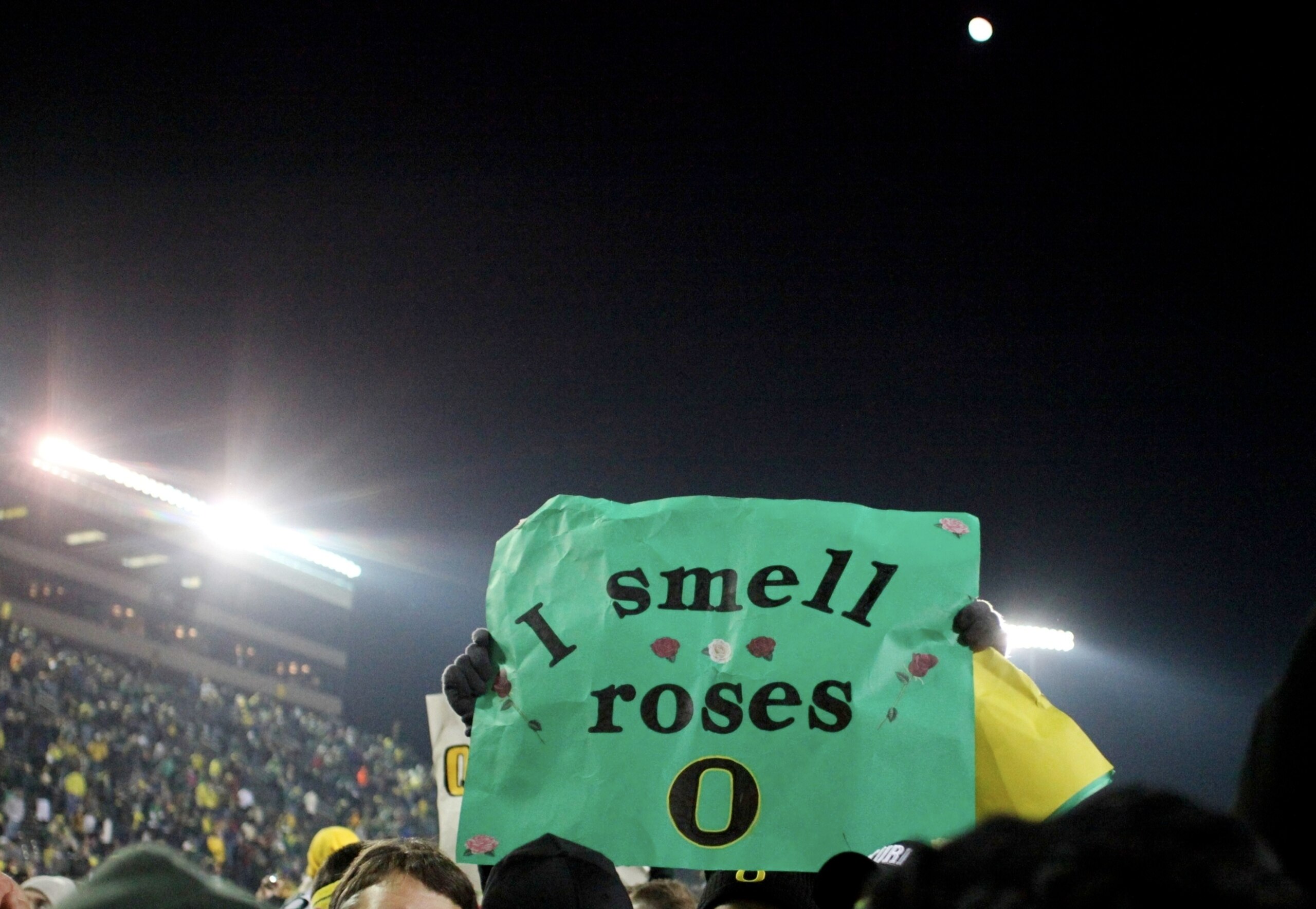 EUGENE,OR - DECEMBER 03: A sign is held by a fan in response to the Oregon Ducks winning the game against the Oregon State Beavers 33-37 to advance to the Rose Bowl on December 3, 2009 in Eugene, Oregon. (Photo by Tom Hauck/Getty Images)