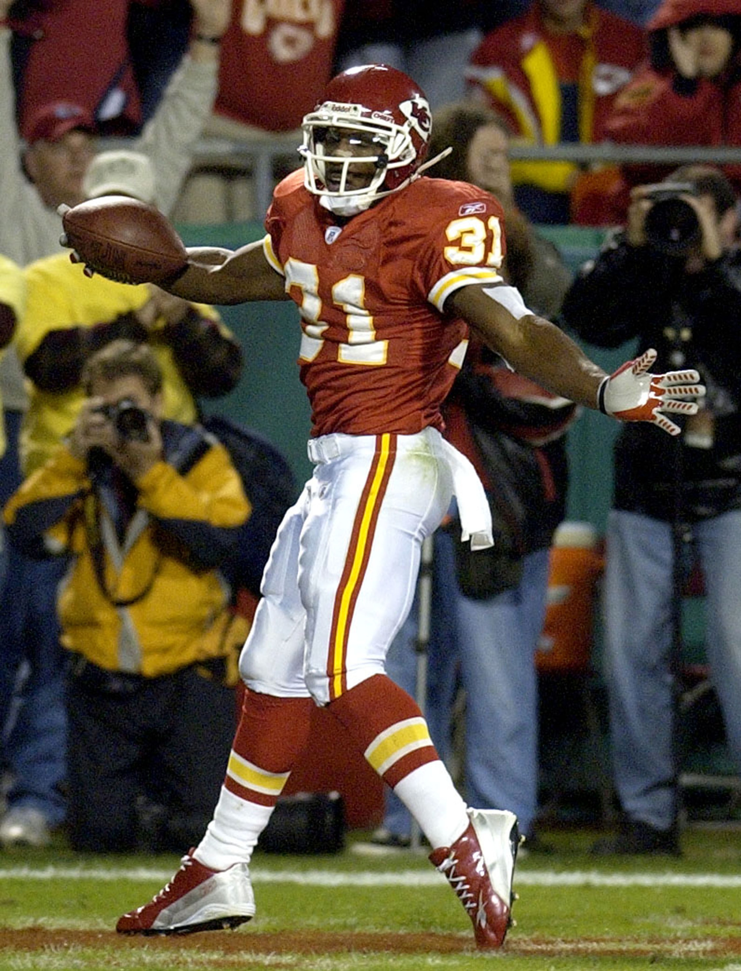 KANSAS CITY, MO - OCTOBER 26:  Running back Priest Holmes #31 of the Kansas City Chiefs celebrates the first of three touchdowns he made against the Buffalo Bills October 26, 2003 at Arrowhead Stadium in Kansas City, Missouri.  The Chiefs won 38-5 and are