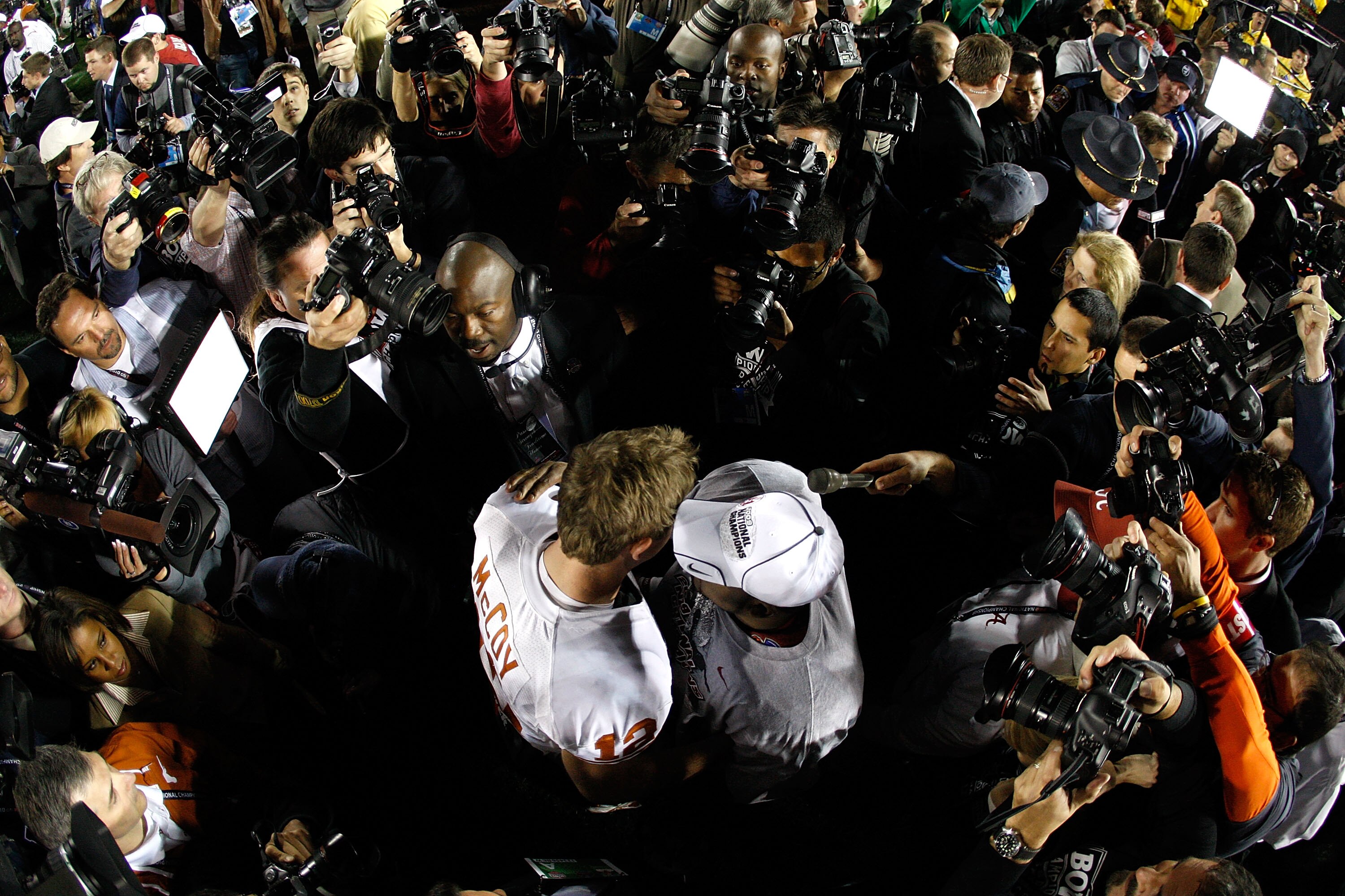 PASADENA, CA - JANUARY 07:  (R-L) Running back Mark Ingram #22 of the Alabama Crimson Tide speaks with quarterback Colt McCoy #12 of the Texas Longhorns following the Citi BCS National Championship game at the Rose Bowl on January 7, 2010 in Pasadena, Cal