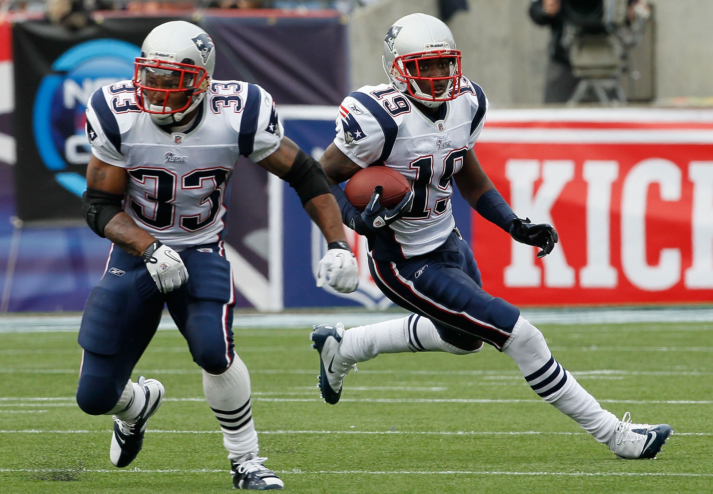 FOXBORO, MA - SEPTEMBER 12:  Brandon Tate #19 of the New England Patriots gains yardage as teammate Kevin Faulk #33 prepares to block during the NFL season opener against the Cincinnati Bengals at Gillette Stadium on September 12, 2010 in Foxboro, Massach