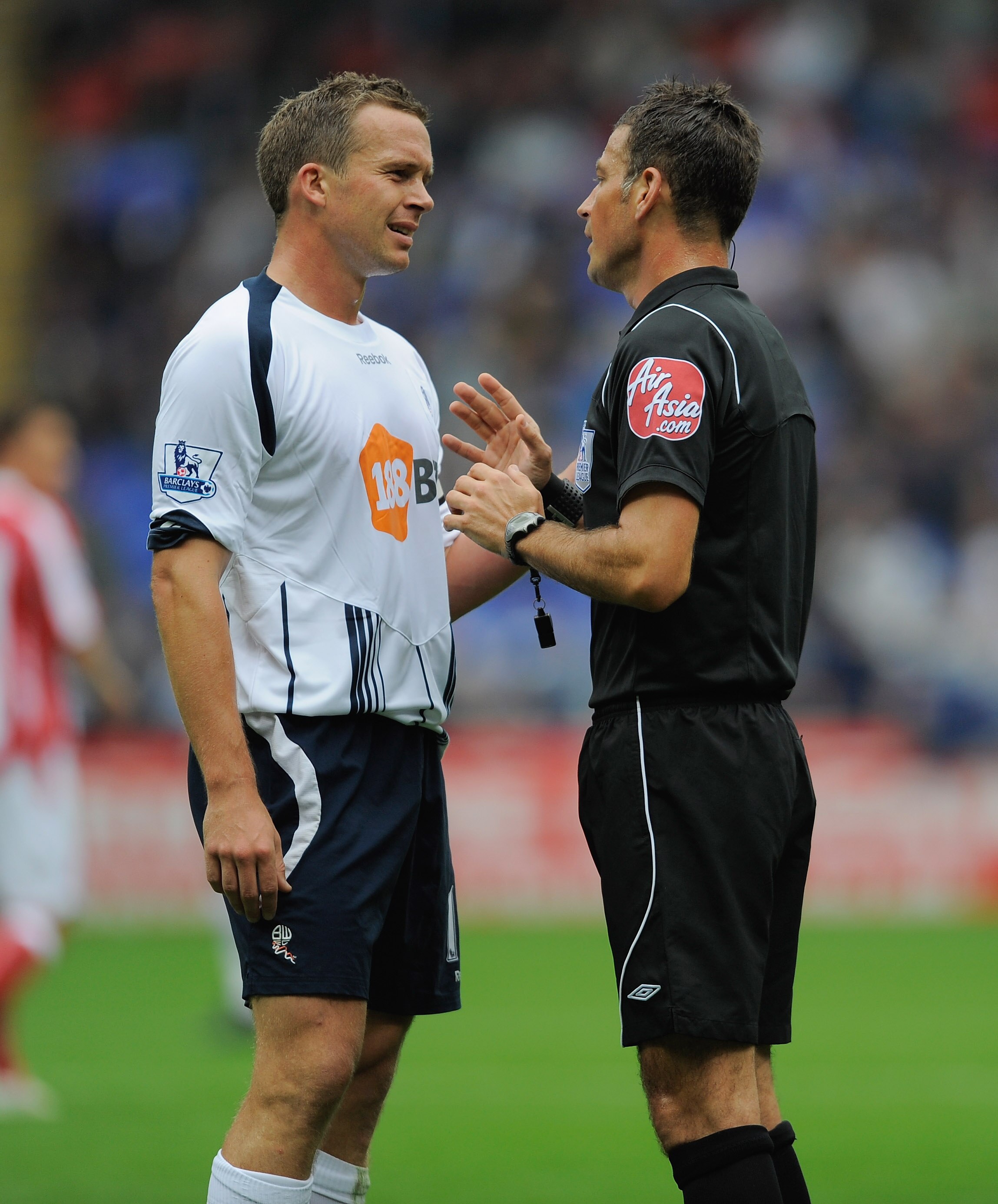 BOLTON, ENGLAND - SEPTEMBER 19: Kevin Davies of Bolton argues with referee Mark Clattenburg during the Barclays Premier League match between Bolton Wanderers and Stoke City at the Reebok Stadium on September 19, 2009 in Bolton, England.  (Photo by Michael