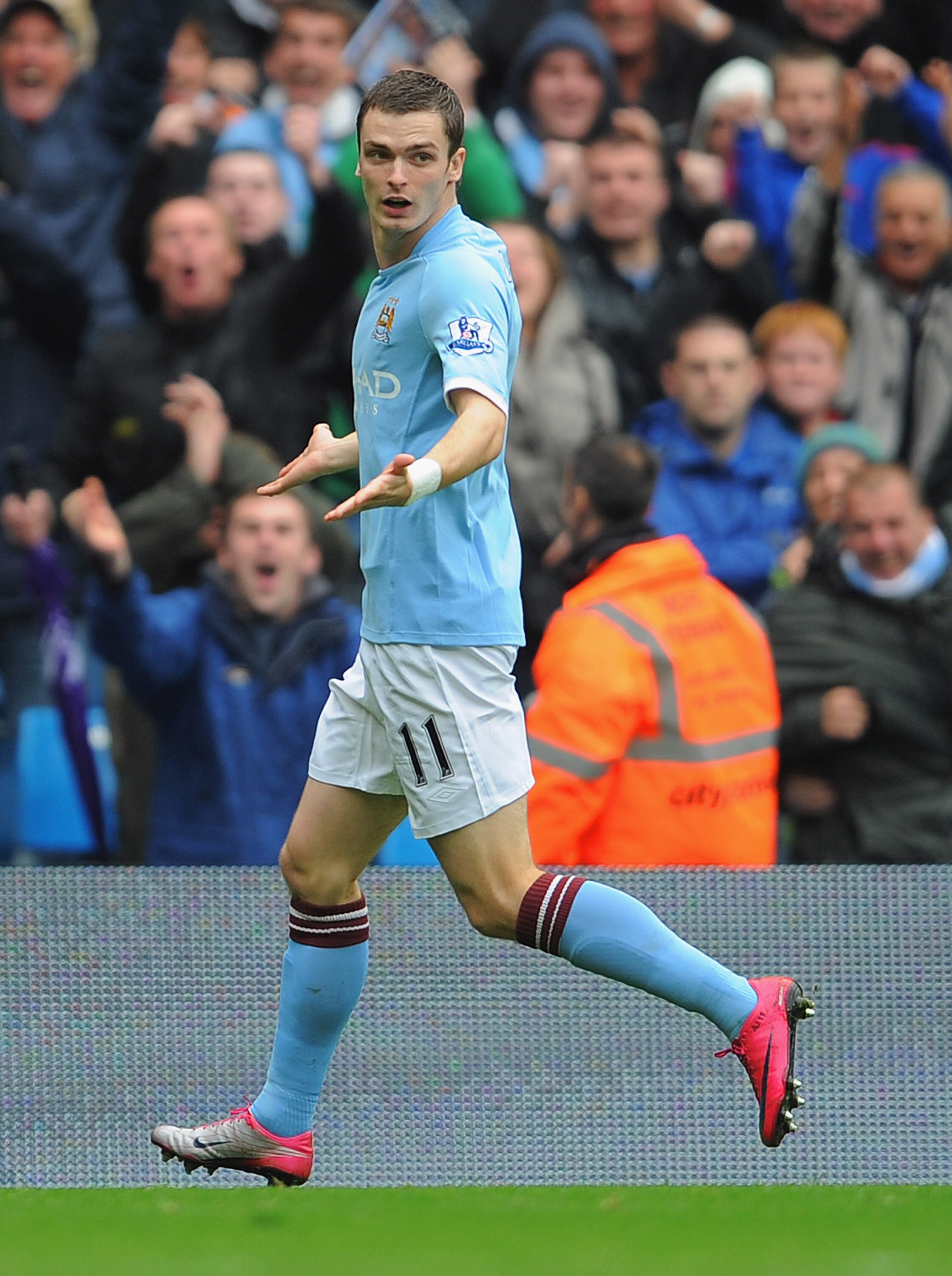 MANCHESTER, ENGLAND - OCTOBER 03: Adam Johnson of Manchester City celebrates making it 2-1 during the Barclays Premier League match between Manchester City and Newcastle United at the City of Manchester Stadium on October 3, 2010 in Manchester, England.