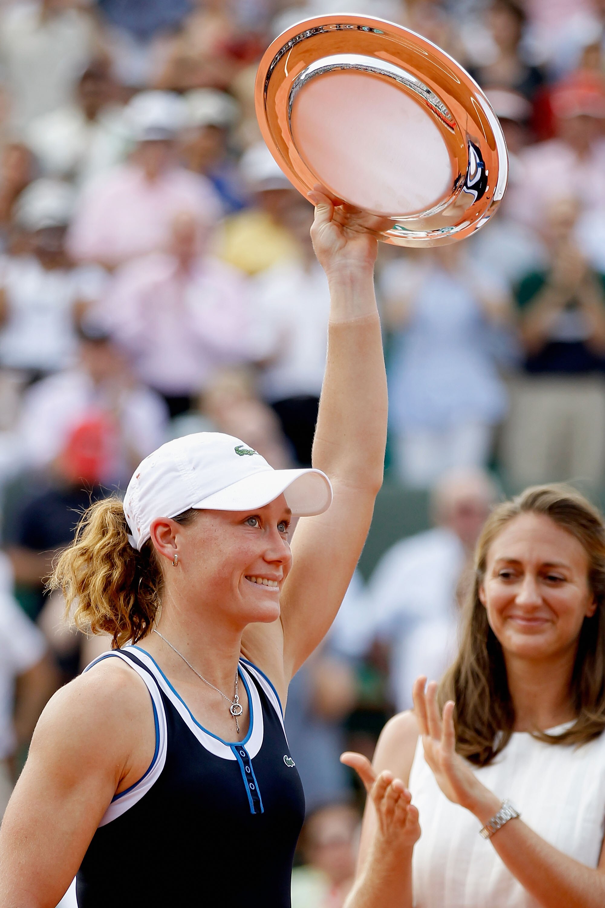 PARIS - JUNE 05:  Samantha Stosur of Australia receives the runners up trophy during the women's singles final match between Francesca Schiavone of Italy and Samantha Stosur of Australia on day fourteen of the French Open at Roland Garros on June 5, 2010