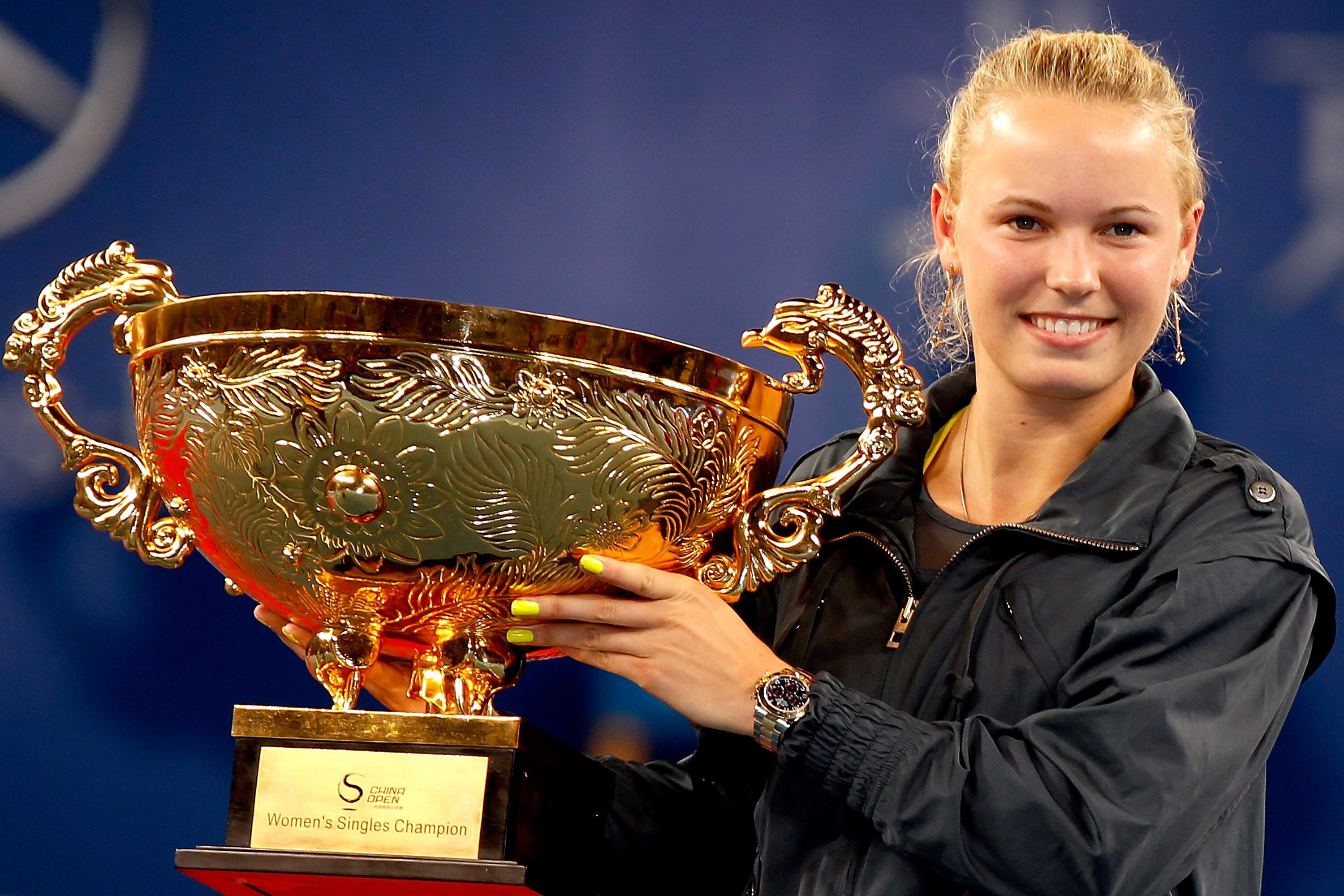 BEIJING - OCTOBER 11:  Caroline Wozniacki of Denmark poses with the trophy after defeating Vera Zvonareva of Russia in the Women's Singles final on day eleven of the 2010 China Open at the National Tennis Center on October 11, 2010 in Beijing, China.  (Ph