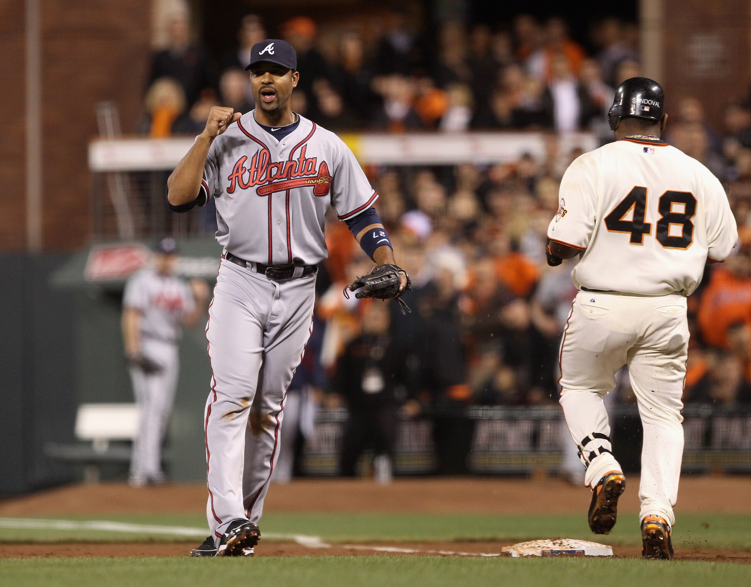 SAN FRANCISCO - OCTOBER 07:  Derrek Lee #27 of the Atlanta Braves pumps his fist after Pablo Sandoval #48 of the San Francisco Giants grounded in to a double play to end the sixth inning during game 1 of the NLDS at AT&T Park on October 7, 2010 in San Fra