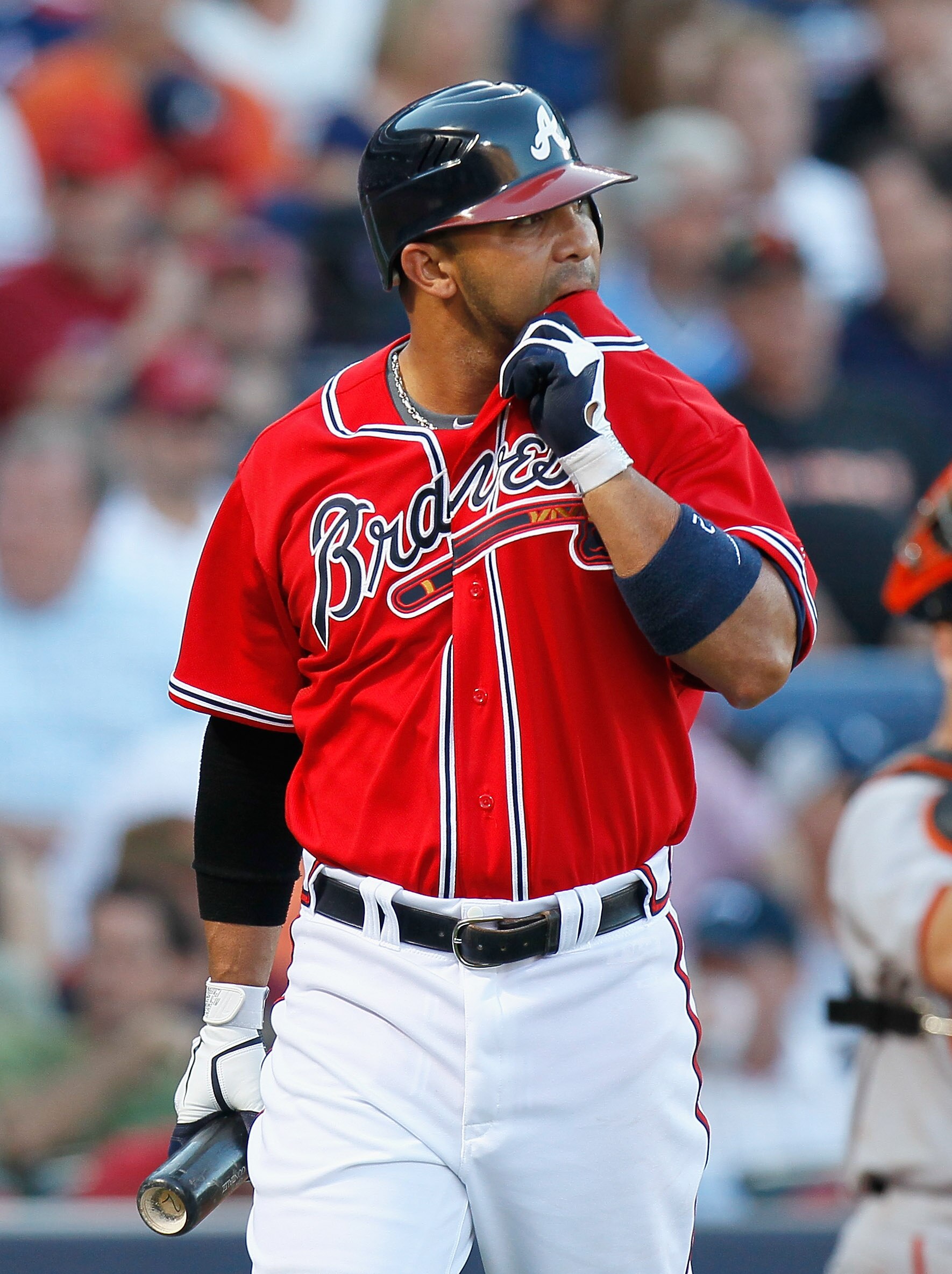 ATLANTA - OCTOBER 10:  Alex Gonzalez #2 of the Atlanta Braves reacts after striking out against the San Francisco Giants during Game Three of the NLDS of the 2010 MLB Playoffs at Turner Field on October 10, 2010 in Atlanta, Georgia.  (Photo by Kevin C. Co