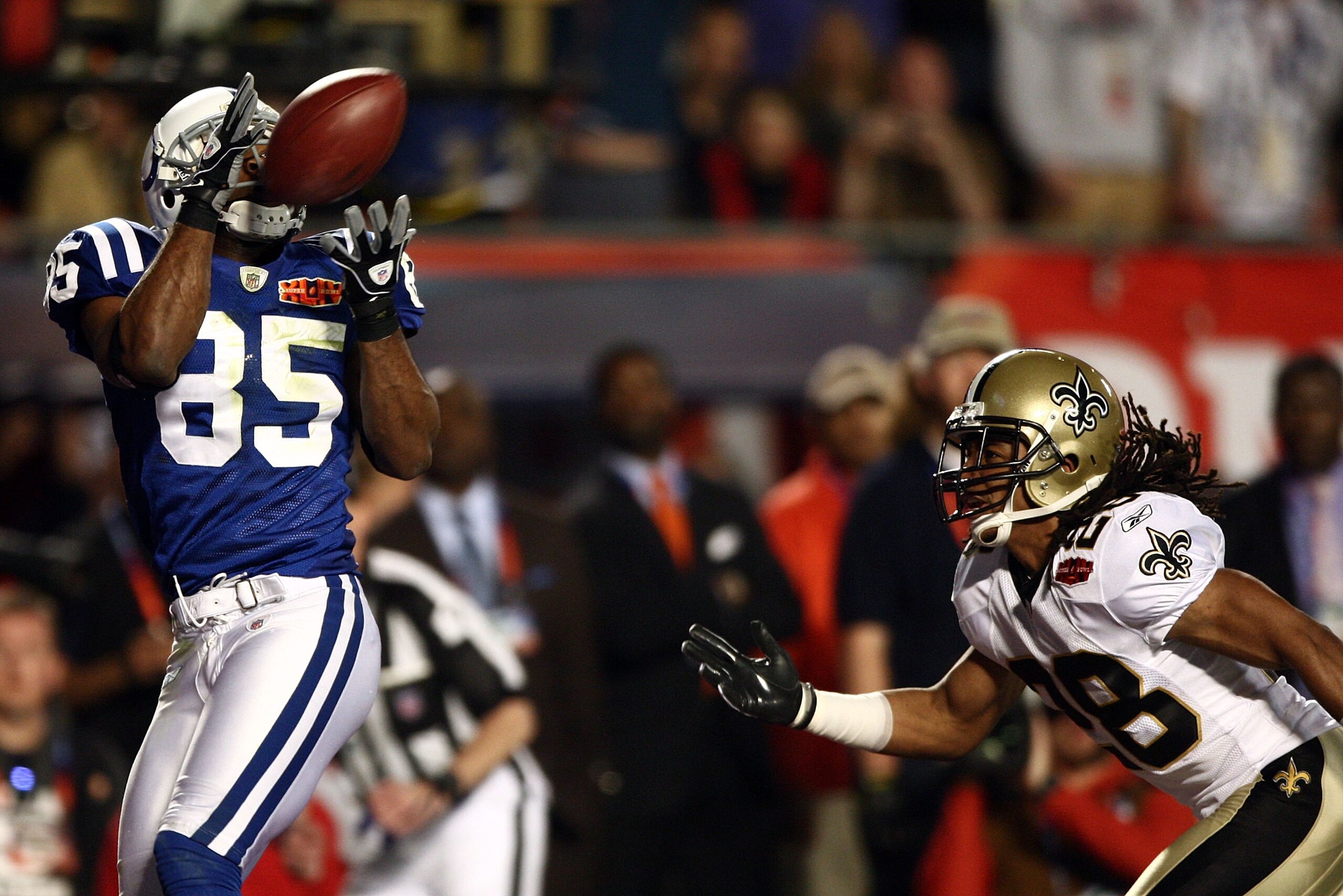 MIAMI GARDENS, FL - FEBRUARY 07:  Pierre Garcon #85 of the Indianapolis Colts catches a touchdown pass in the first quarter against the New Orleans Saints during Super Bowl XLIV on February 7, 2010 at Sun Life Stadium in Miami Gardens, Florida.  (Photo by