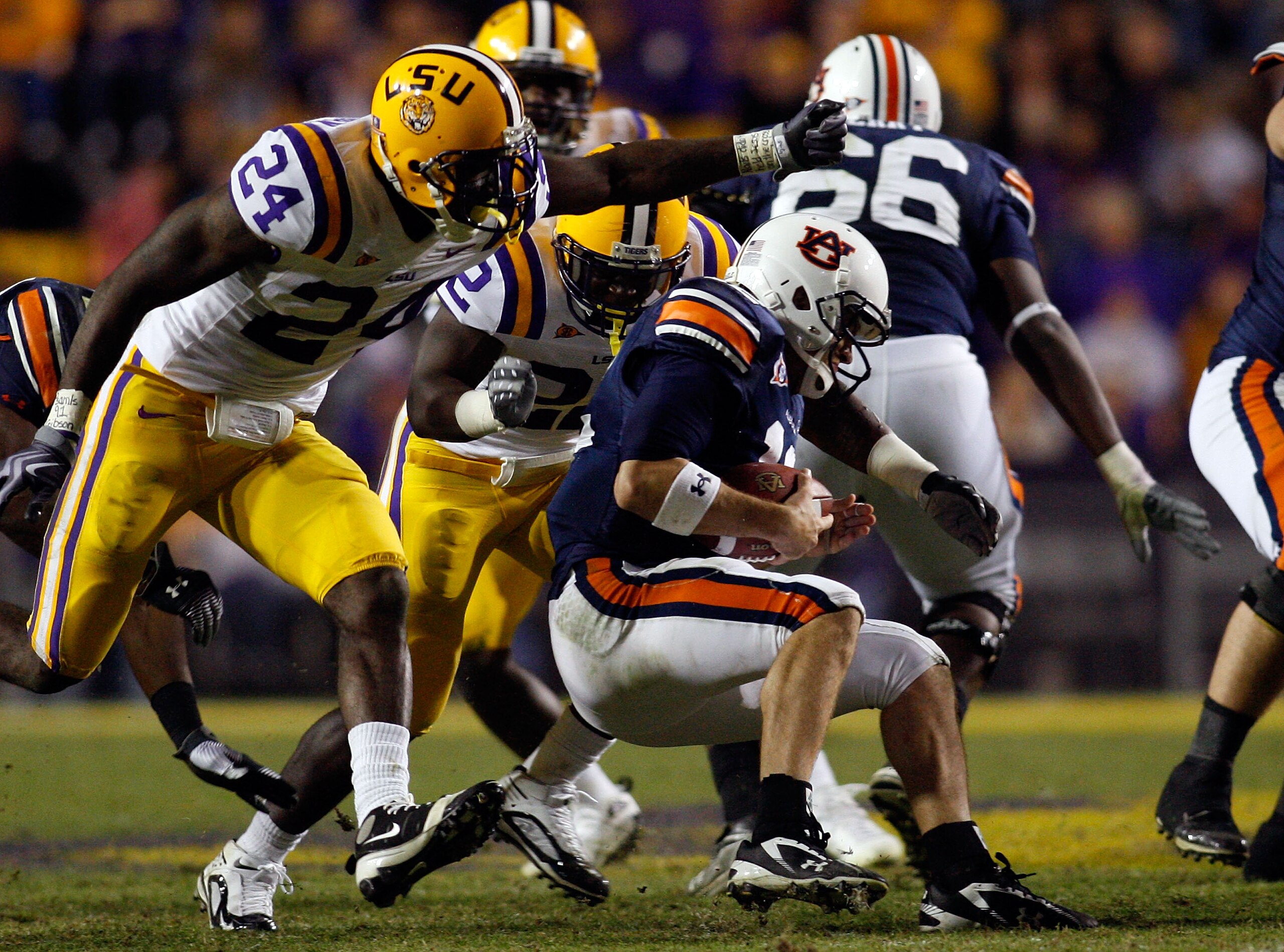 BATON ROUGE, LA - OCTOBER 24:  Ryan Baker #22 of the Louisiana State University Tigers sacks Chris Todd #12 of the Auburn Tigers at Tiger Stadium on October 24, 2009 in Baton Rouge, Louisiana.  LSU defeated Auburn 31-10.    (Photo by Chris Graythen/Getty