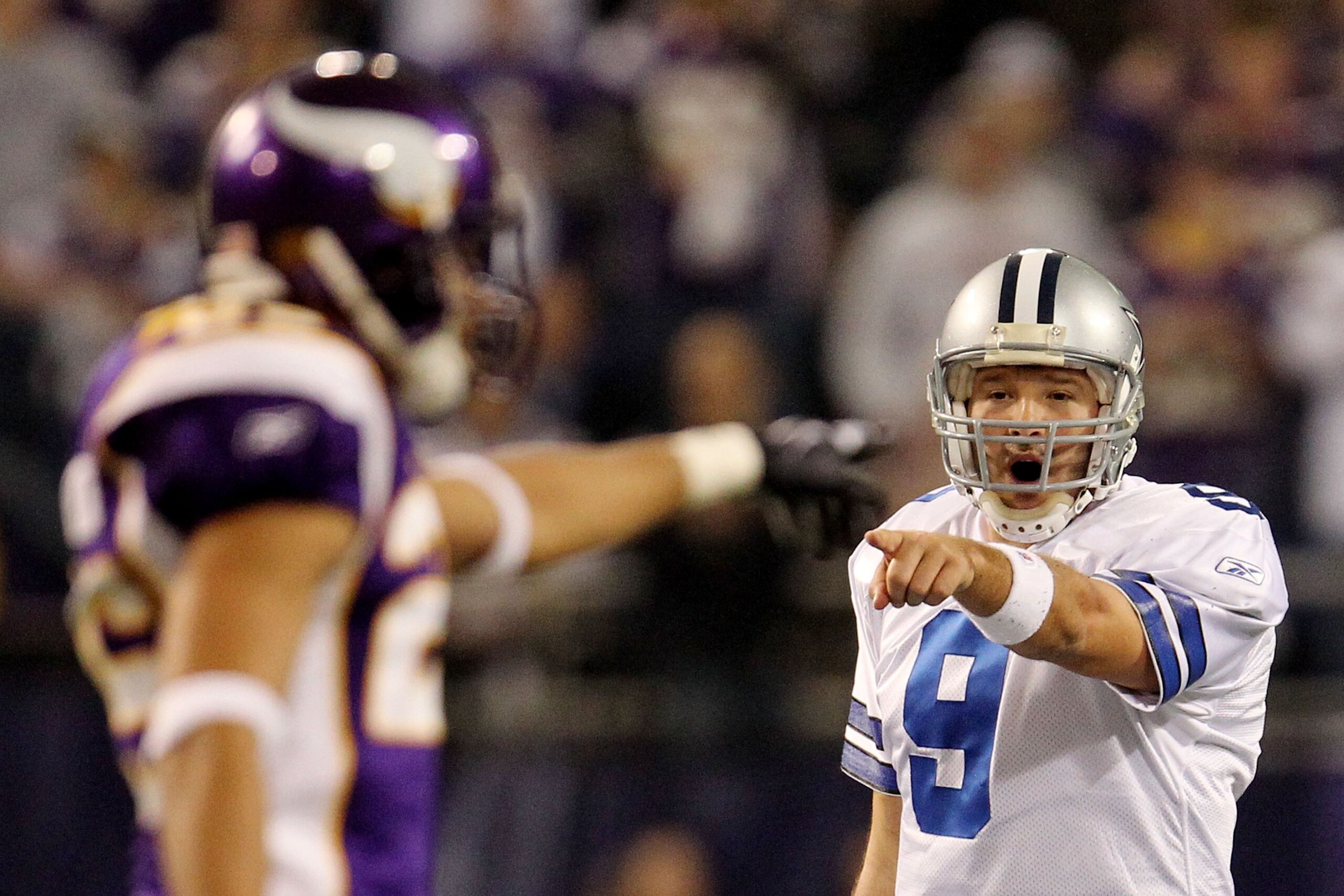 MINNEAPOLIS - JANUARY 17:  Tony Romo #9 of the Dallas Cowboys reacts during the game against the Minnesota Vikings during the NFC Divisional Playoff Game at Hubert H. Humphrey Metrodome on January 17, 2010 in Minneapolis, Minnesota. The Vikings defeated t