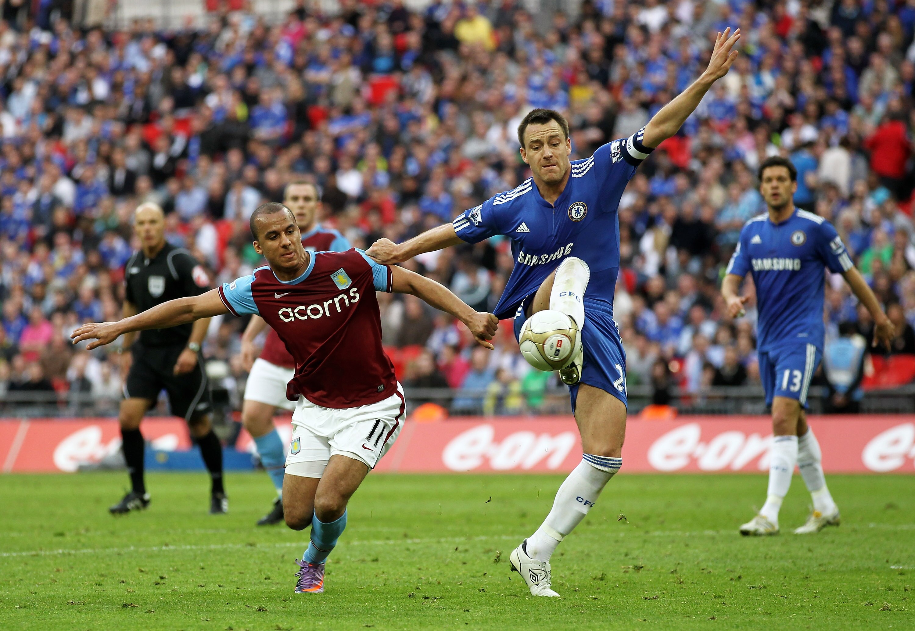 LONDON, ENGLAND - APRIL 10:  Gabriel Agbonlahor of Aston Villa and John Terry of Chelsea battle for the ball during the FA Cup sponsored by E.ON Semi Final match between Aston Villa and Chelsea at Wembley Stadium on April 10, 2010 in London, England.  (Ph