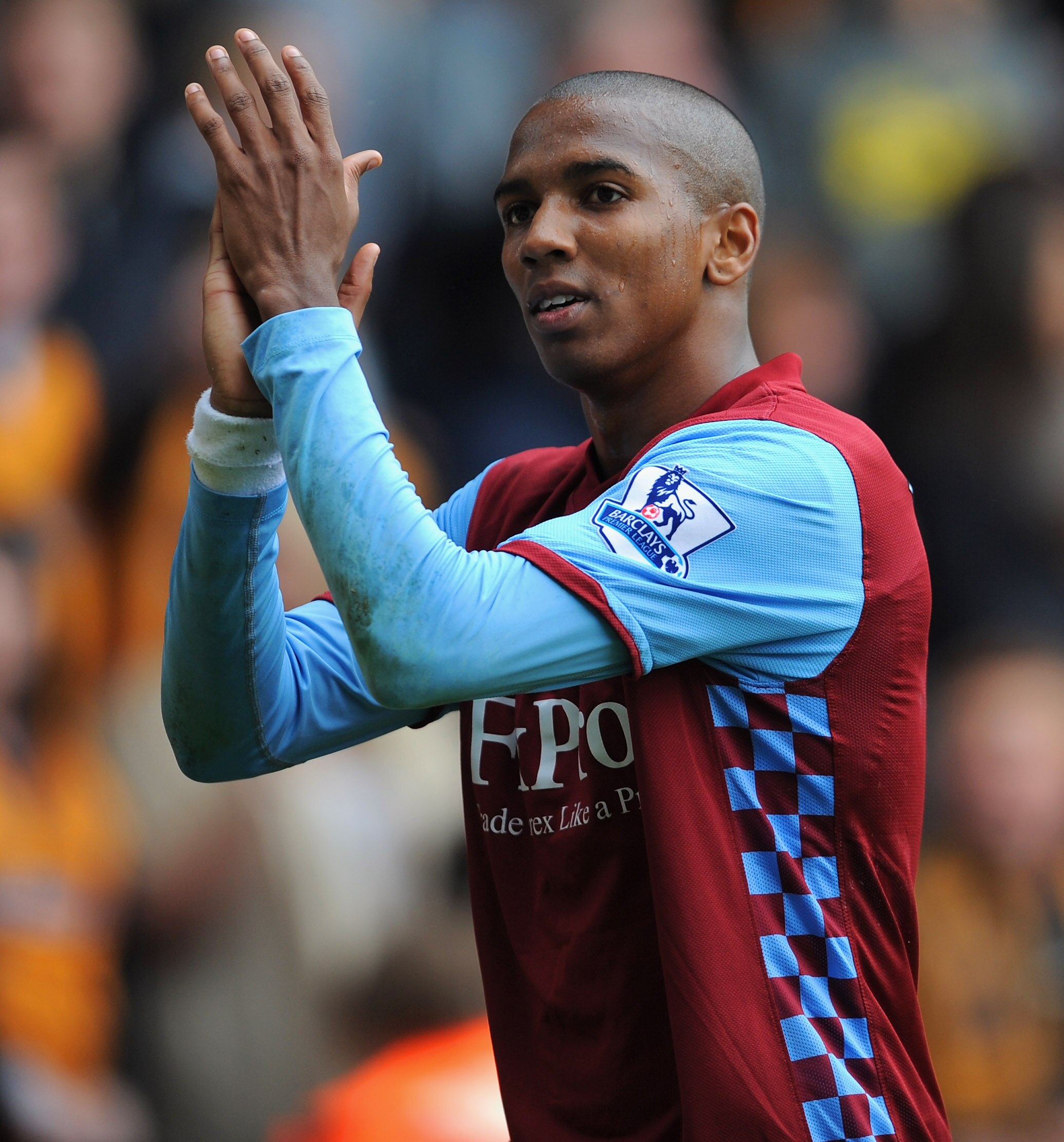 WOLVERHAMPTON, ENGLAND - SEPTEMBER 26:  Ashley Young of Aston Villa gestures to fans during the Barclays Premier League match between Wolverhampton Wanderers and Aston Villa at Molineux on September 26, 2010 in Wolverhampton, England.  (Photo by Michael R