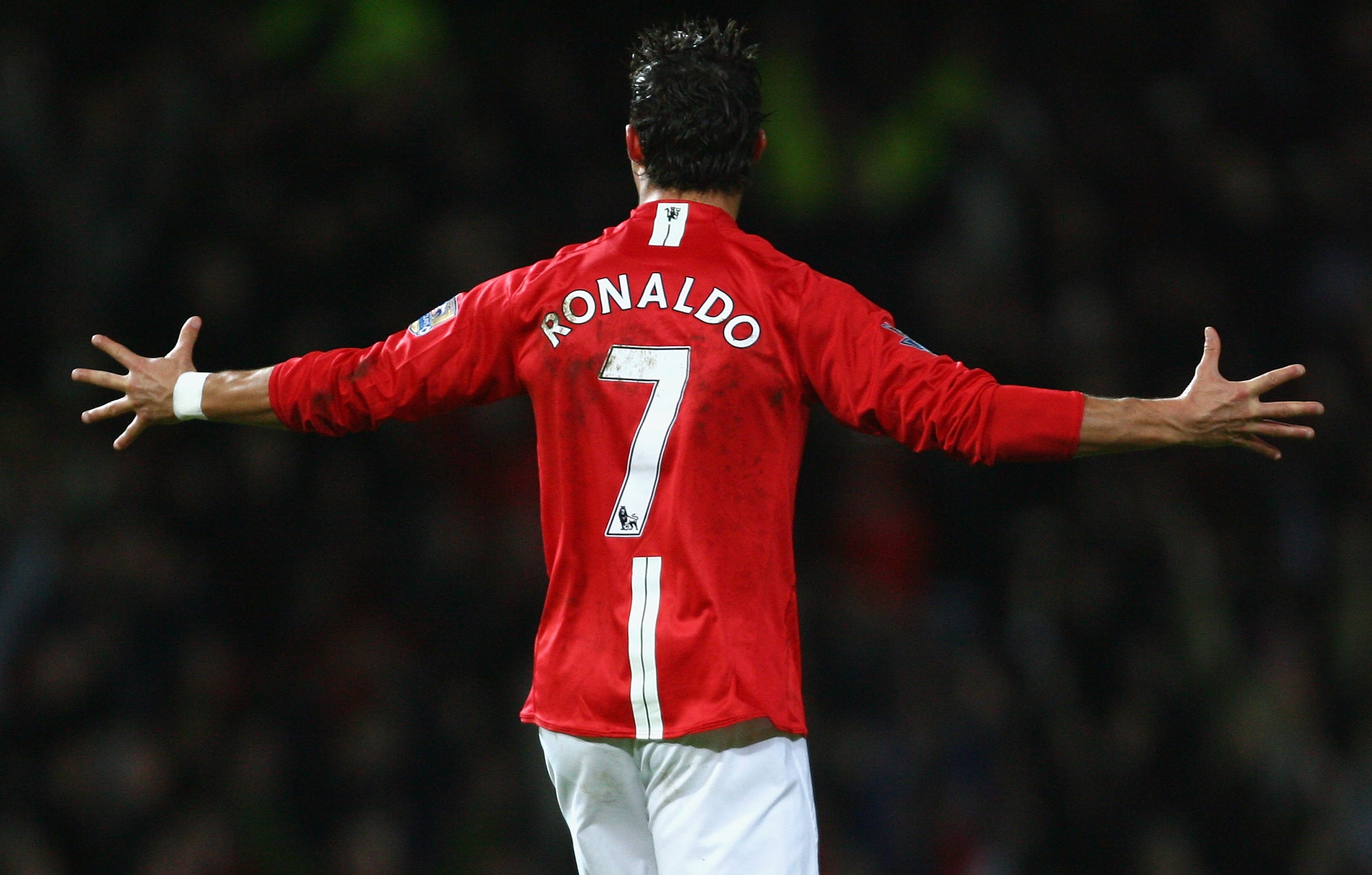 MANCHESTER, UNITED KINGDOM - JANUARY 30:  Cristiano Ronaldo of Manchester United celebrates scoring his team's second goal during the Barclays Premier League match between Manchester United and Portsmouth at Old Trafford on January 30, 2008 in Manchester,