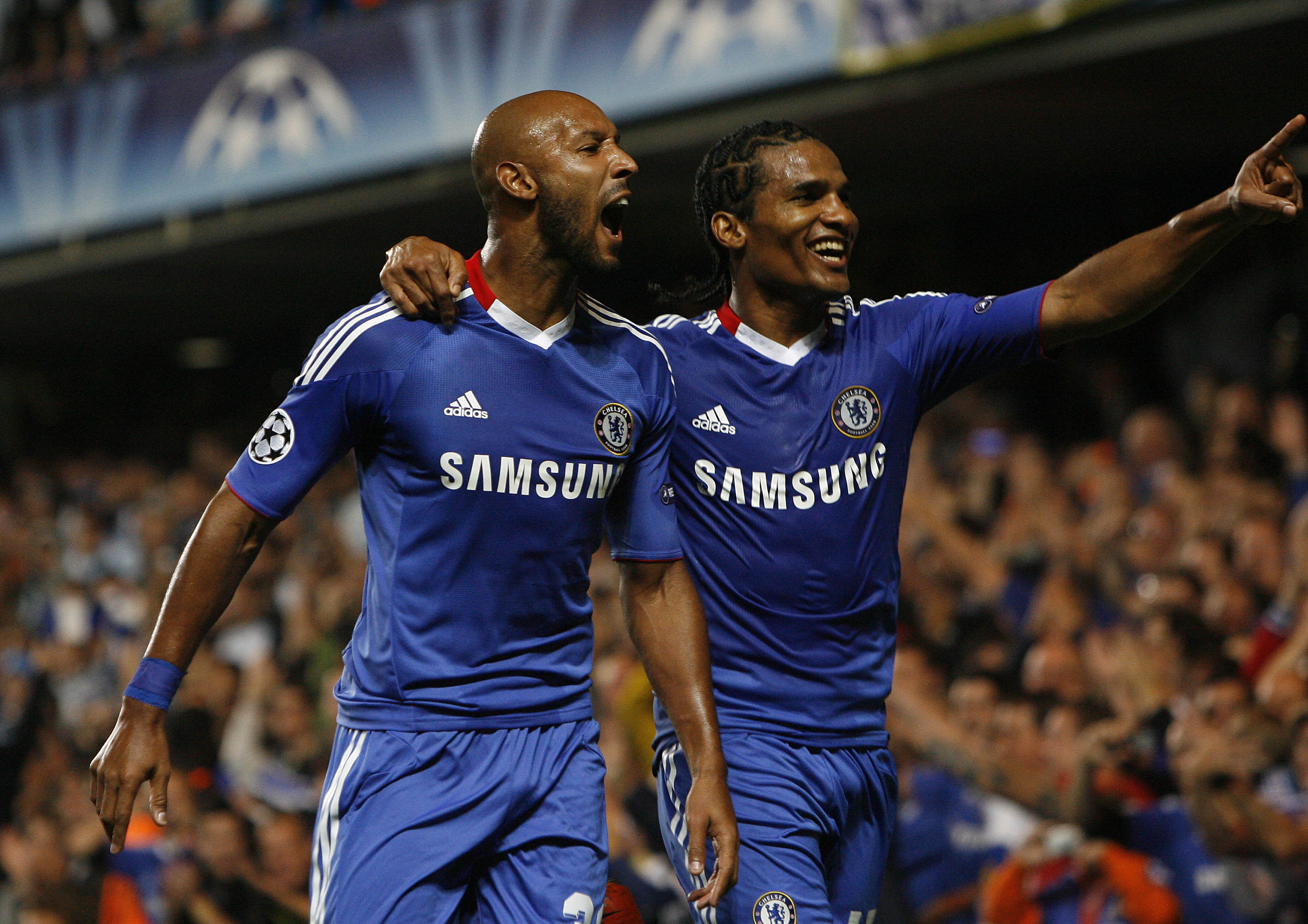 LONDON, ENGLAND - SEPTEMBER 28:  Nicolas Anelka (L) of Chelsea celebrates his goal from the penalty spot with team-mate Florent Malouda during the UEFA Champions League Group F match between Chelsea and Marseille at Stamford Bridge on September 28, 2010 i