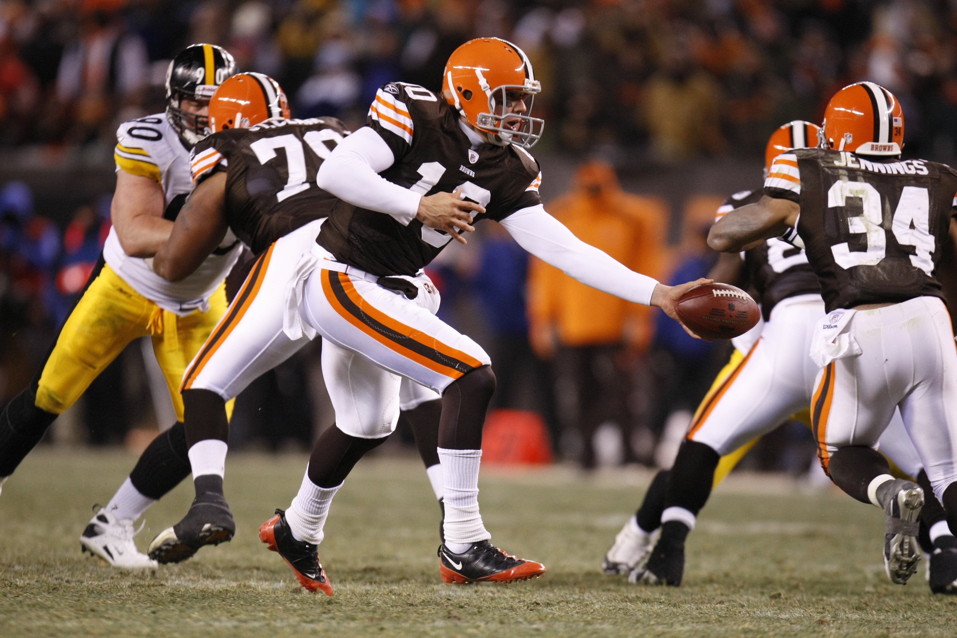 CLEVELAND - DECEMBER 10:  Brady Quinn #10 of the Cleveland Browns hands off to Chris Jennings #34 during the game against the Pittsburgh Steelers on December 10, 2009 at Cleveland Browns Stadium in Cleveland, Ohio. Cleveland won the game 13-6.  (Photo by