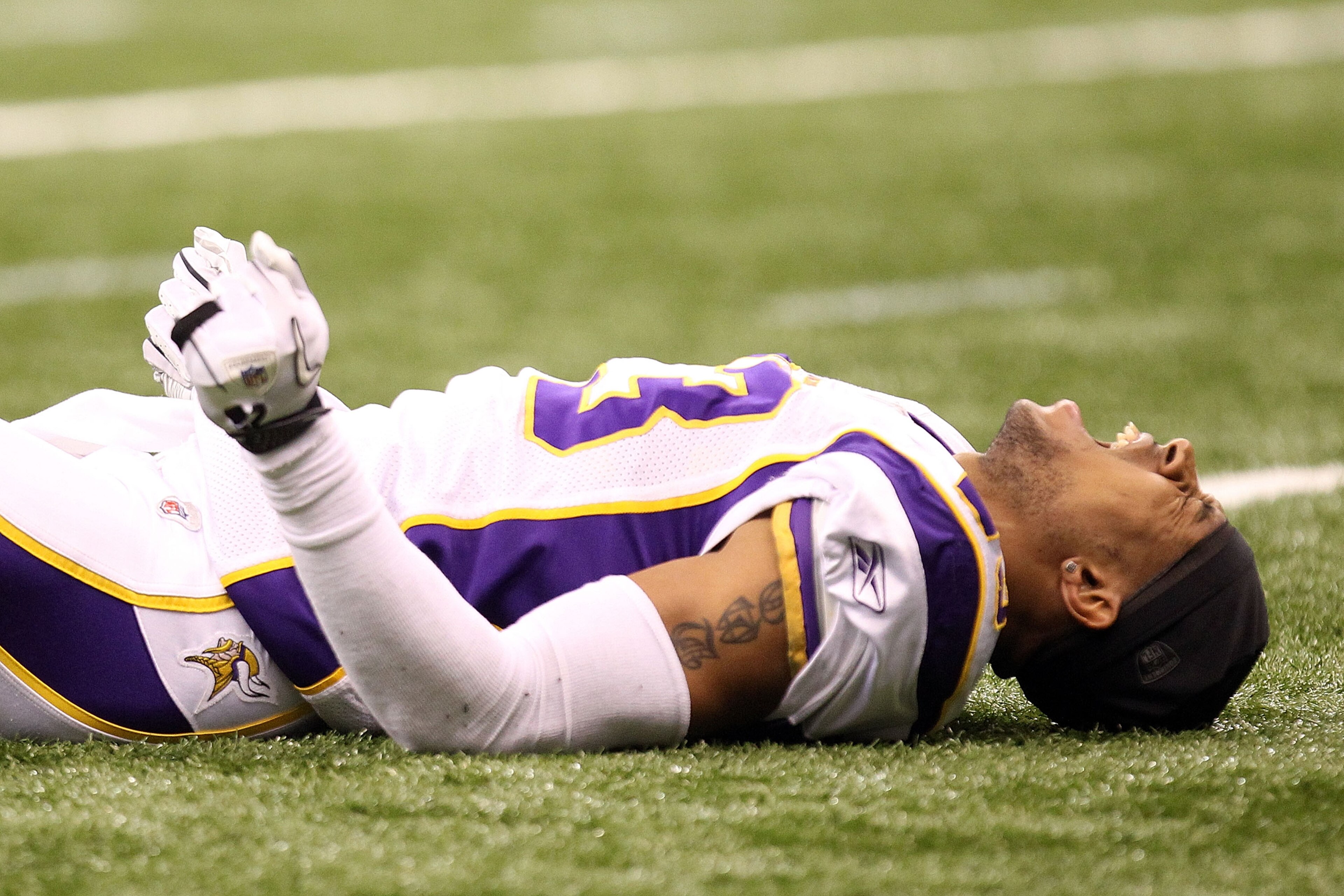 NEW ORLEANS - JANUARY 24:  Cedric Griffin #23 of the Minnesota Vikings reacts after getting injured during the NFC Championship Game at the Louisiana Superdome on January 24, 2010 in New Orleans, Louisiana.  (Photo by Ronald Martinez/Getty Images)