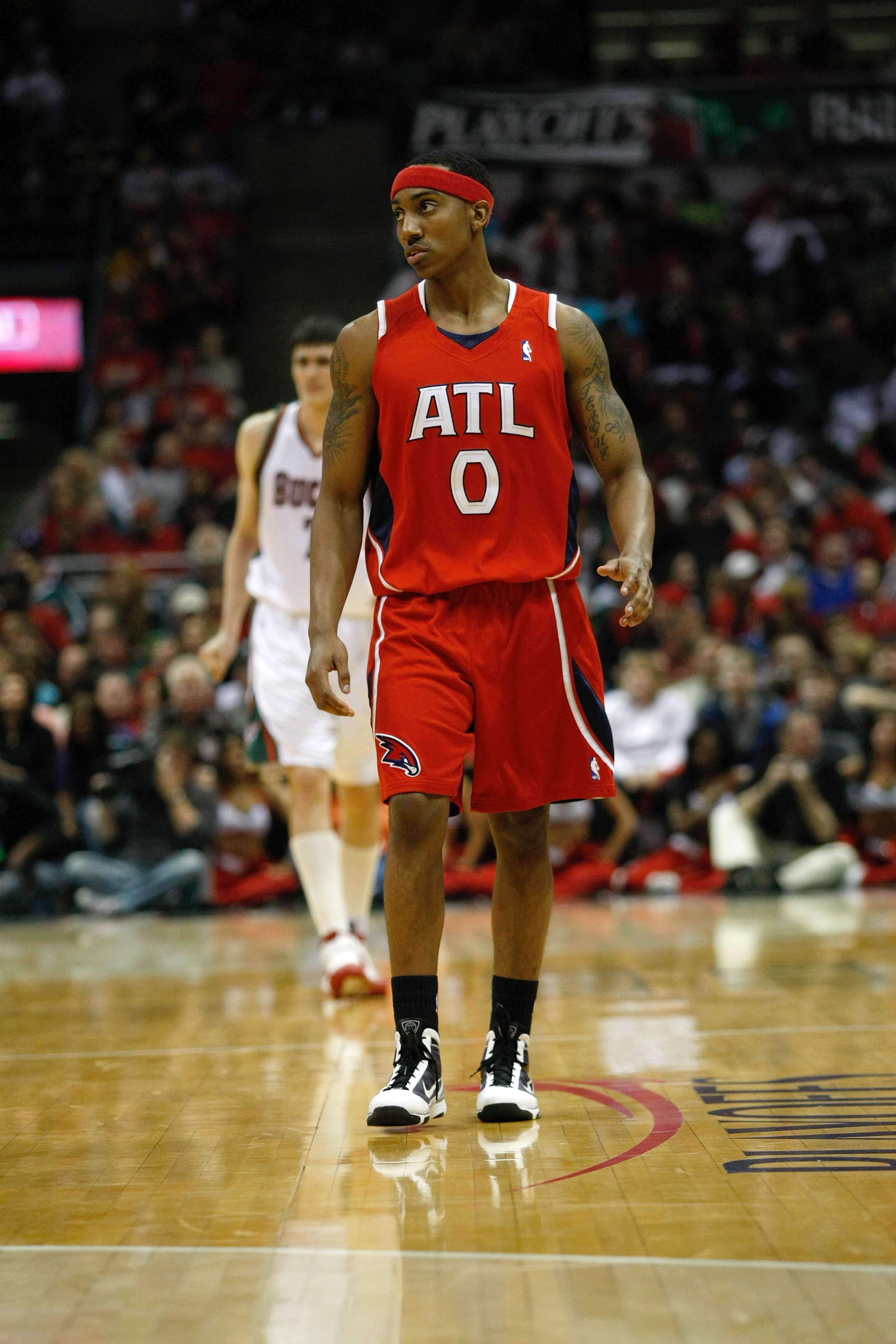 MILWAUKEE, WI - APRIL 24: Jeff Teague #0 of the Atlanta Hawks walks on the court against the Milwaukee Bucks during Game Three of Eastern Conference Quarterfinals of the 2010 NBA Playoffs at the Bradley Center on April 24, 2010 in Milwaukee, Wisconsin. Th