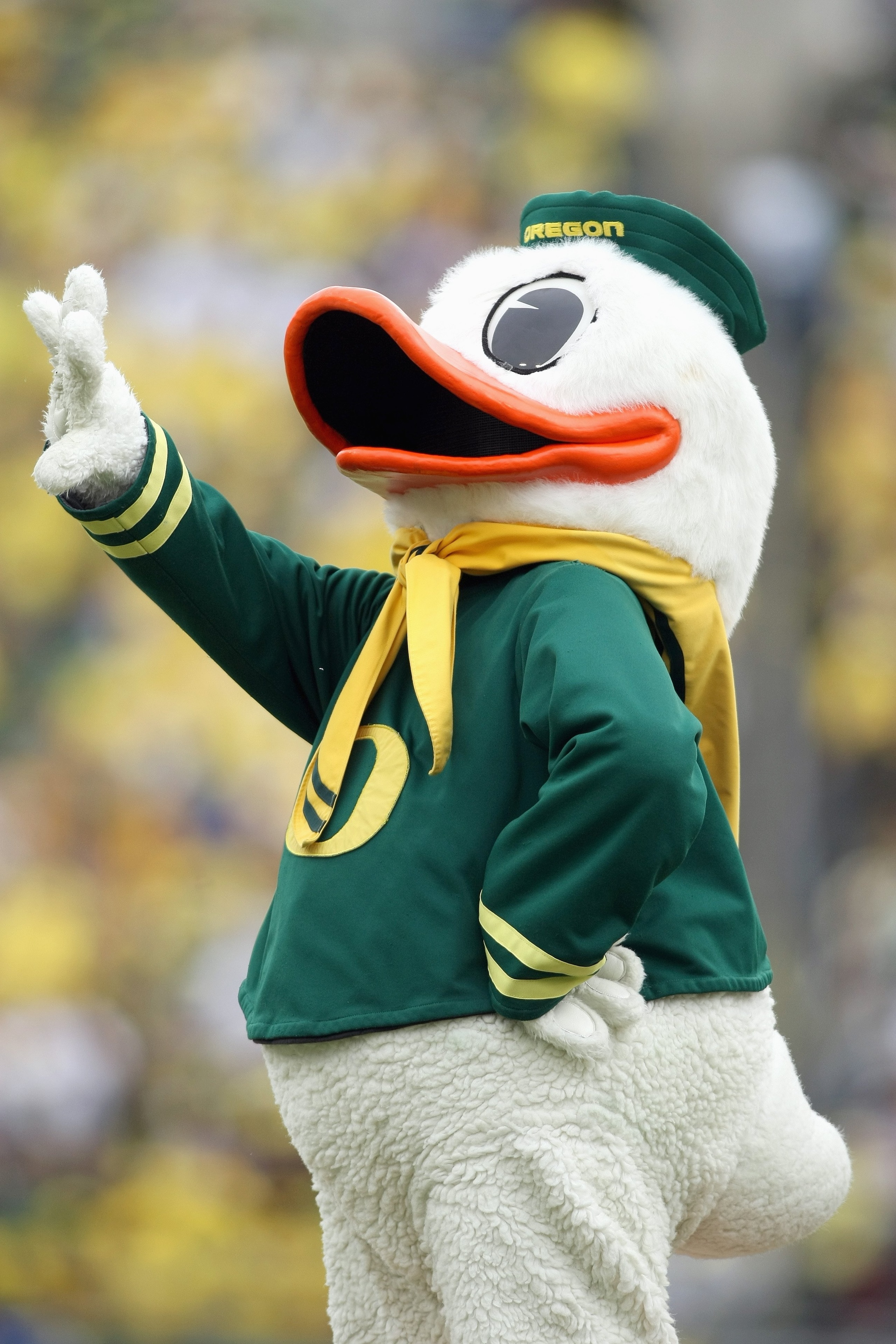 EUGENE, CA - SEPTEMBER 29:The Oregon Duck mascot waves to the crowd against the California Golden Bears at Autzen Stadium on September 29, 2007 in Eugene, Oregon.  (Photo by Jonathan Ferrey/Getty Images)