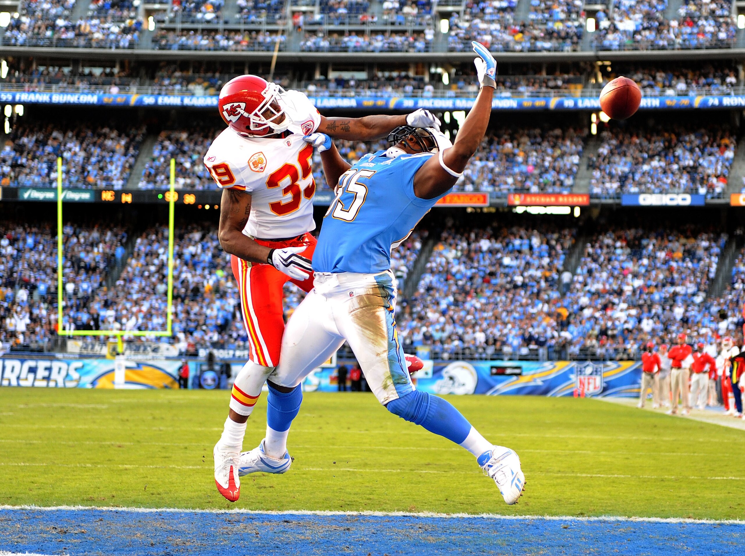 SAN DIEGO - NOVEMBER 29:  Antonio Gates #85 of the San Diego Chargers misses a catch as he is hit by Brandon Carr #39 of the Kansas City Chiefs who was called for pass interference during the fourth quarter at Qualcomm Stadium on November 29, 2009 in San