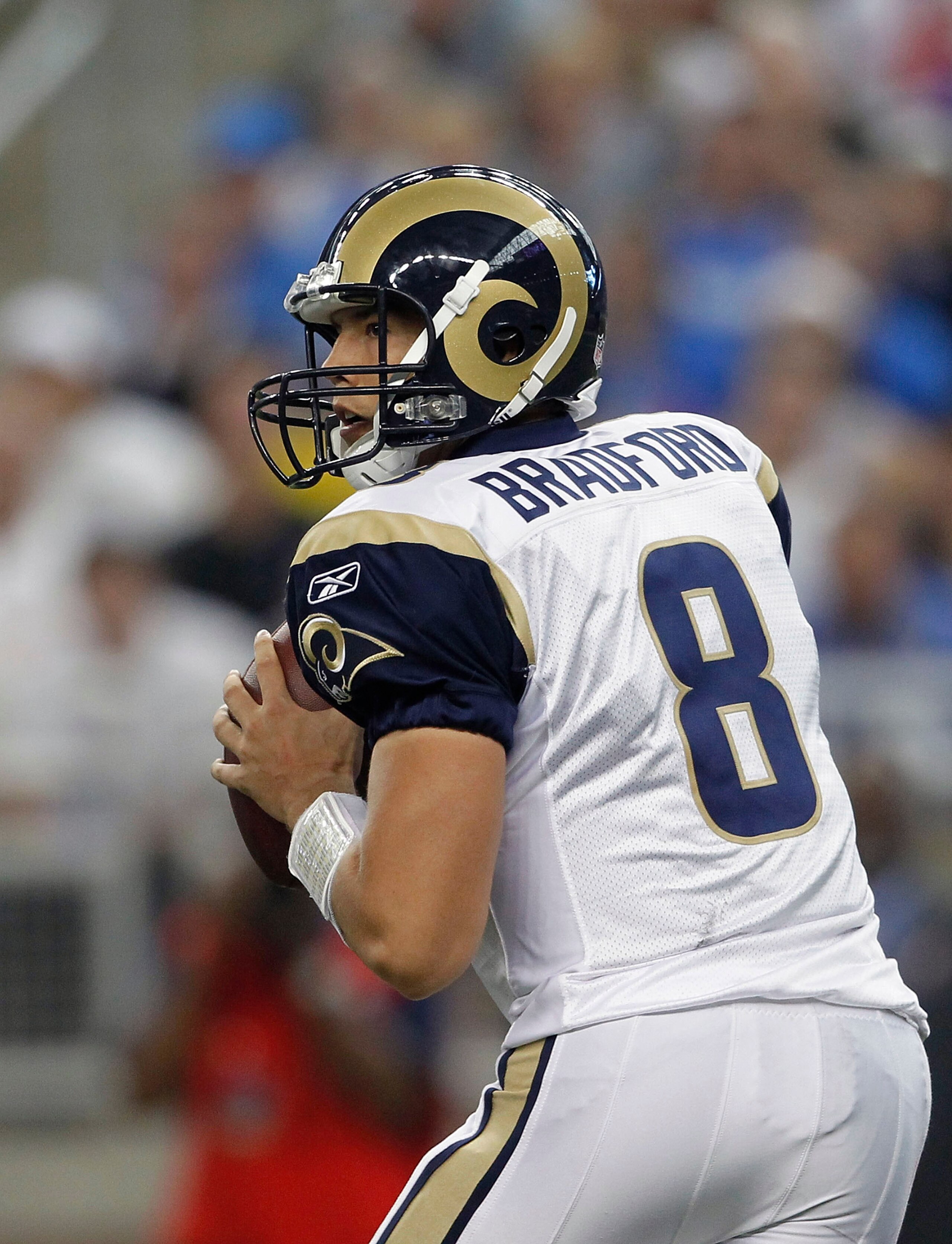 DETROIT - OCTOBER 10: Sam Bradford #8 of the St. Louis Rams drops back to pass during the fourth quarter during the game against the Detroit Lions at Ford Field on October 10, 2010 in Detroit, Michigan. The Lions defeated the Rams 44-6. (Photo by Leon H DETROIT - OCTOBER 10: Sam Bradford #8 of the St. Louis Rams drops back to pass during the fourth quarter during the game against the Detroit Lions at Ford Field on October 10, 2010 in Detroit, Michigan. The Lions defeated the Rams 44-6. (Photo by Leon H