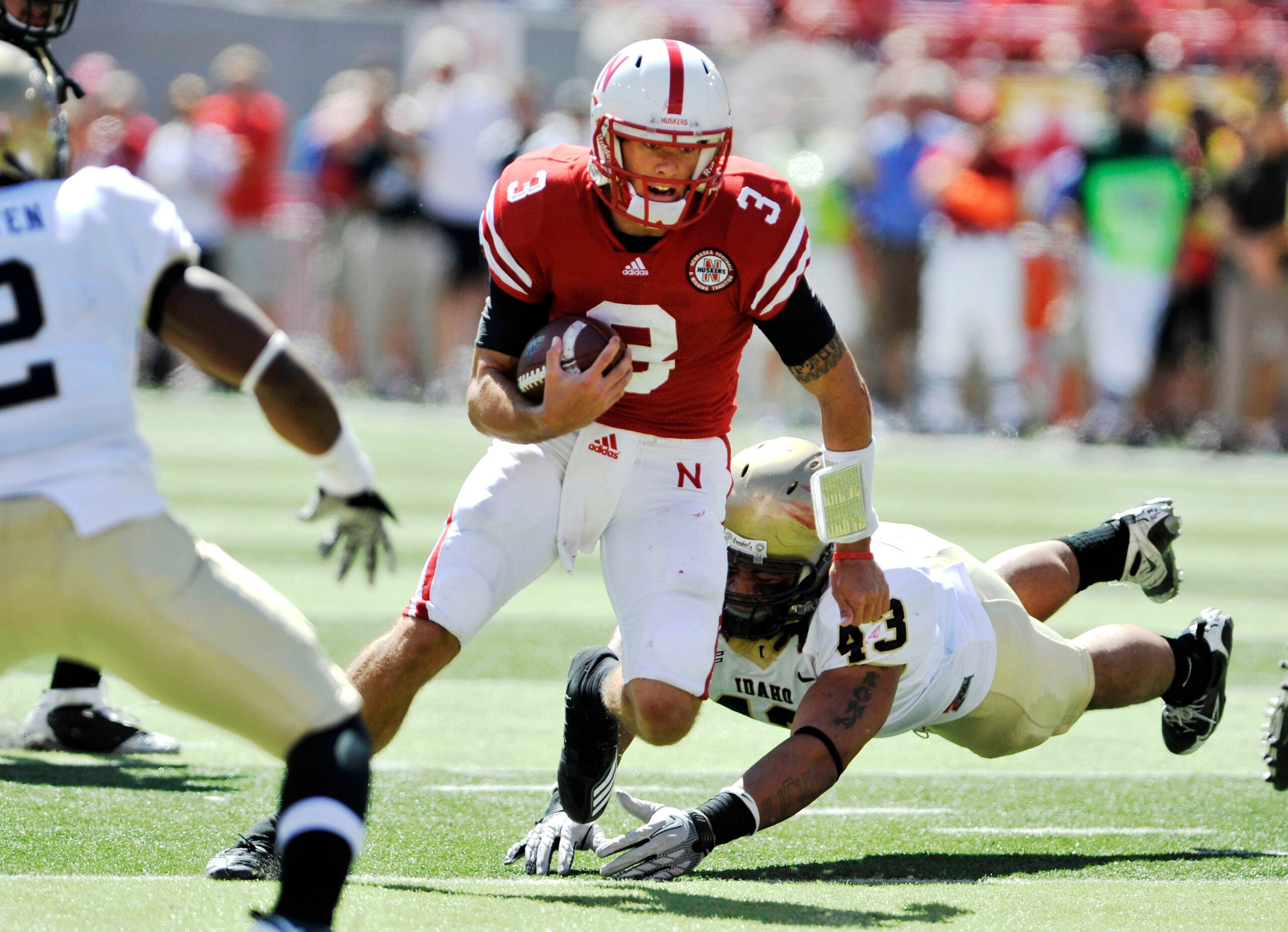 LINCOLN, NEBRASKA - SEPTEMBER 11: Nebraska Cornhuskers quarterback Taylor Martinez #3 works twoard the endzone during first half action of their game at Memorial Stadium on September 4, 2010 in Lincoln, Nebraska. Martinez covered the ball in the end zone LINCOLN, NEBRASKA - SEPTEMBER 11: Nebraska Cornhuskers quarterback Taylor Martinez #3 works twoard the endzone during first half action of their game at Memorial Stadium on September 4, 2010 in Lincoln, Nebraska. Martinez covered the ball in the end zone