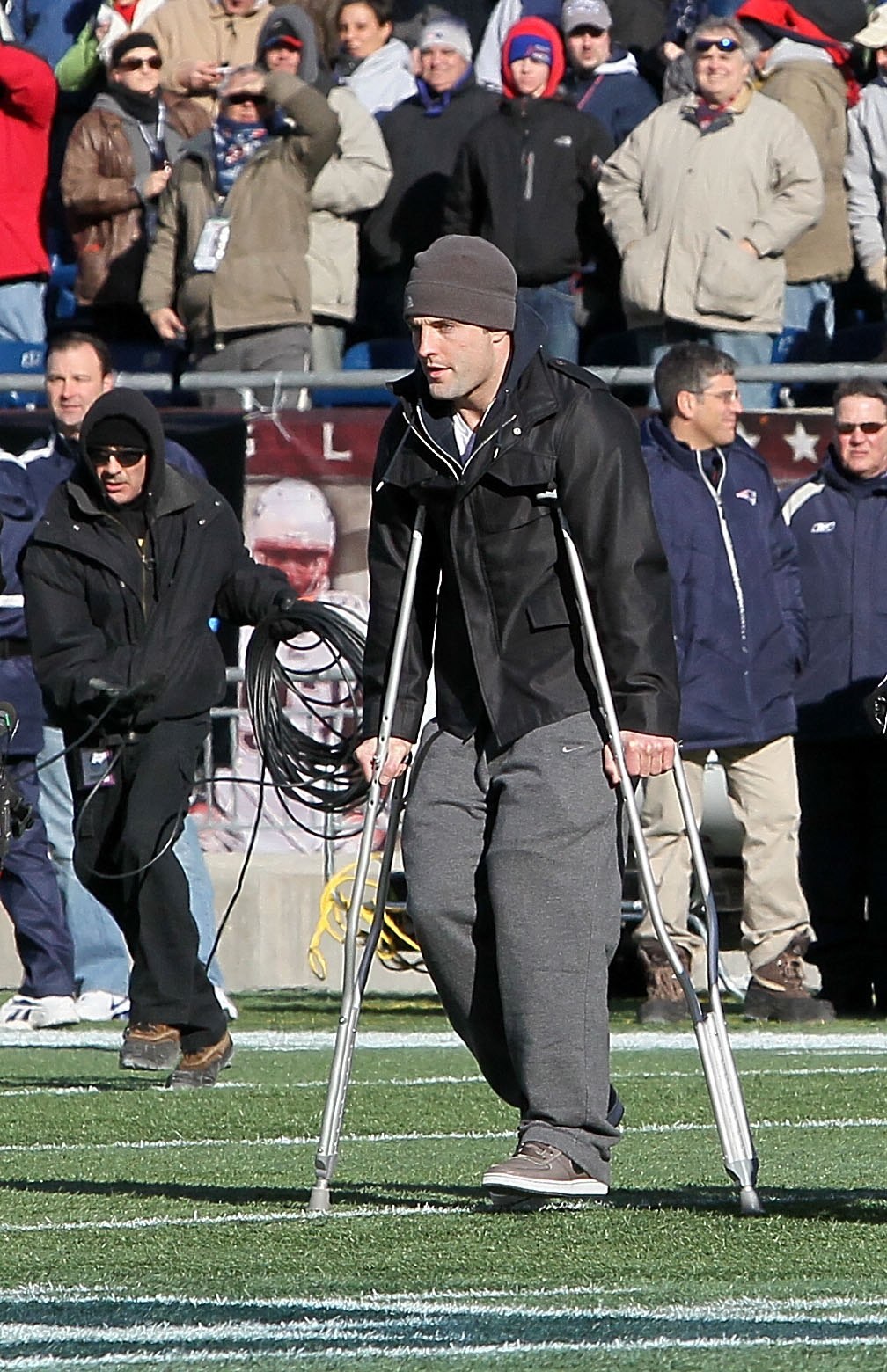 FOXBORO, MA - JANUARY 10:  Injured Wes Welker #83 of the New England Patriots walks on crutches out to midfield for the captain's meeting against the Baltimore Ravens during the 2010 AFC wild-card playoff game at Gillette Stadium on January 10, 2010 in Fo