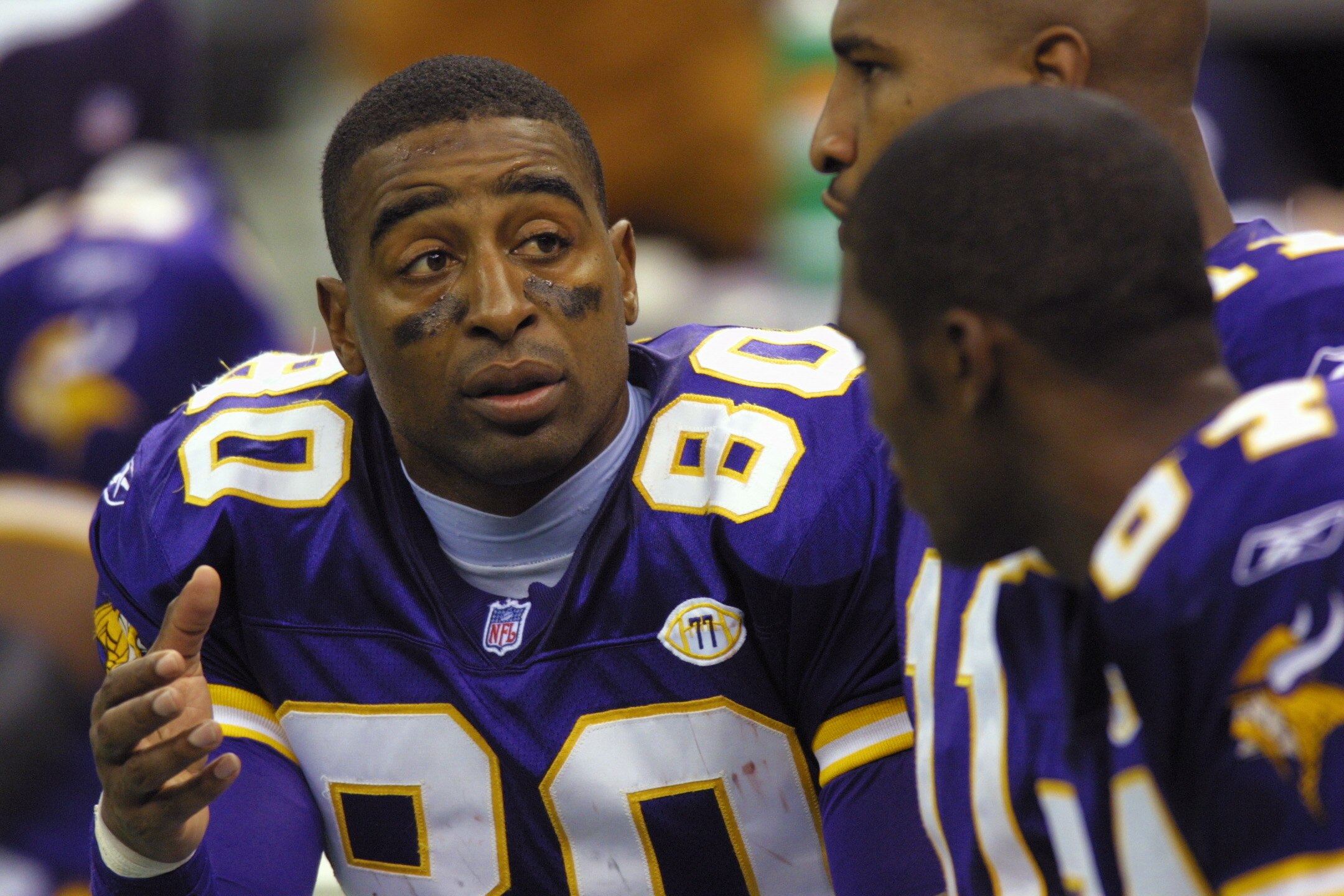 7 Oct 2001: Cris Carter #80 talks with teammates Daunte Culpepper #11 and Randy Moss #84 of the Minnesota Vikings during the game against the New Orleans Saints at the Superdome in New Orleans, Louisiana. The Saints won 28-15. DIGITAL IMAGE. Mandatory Cre