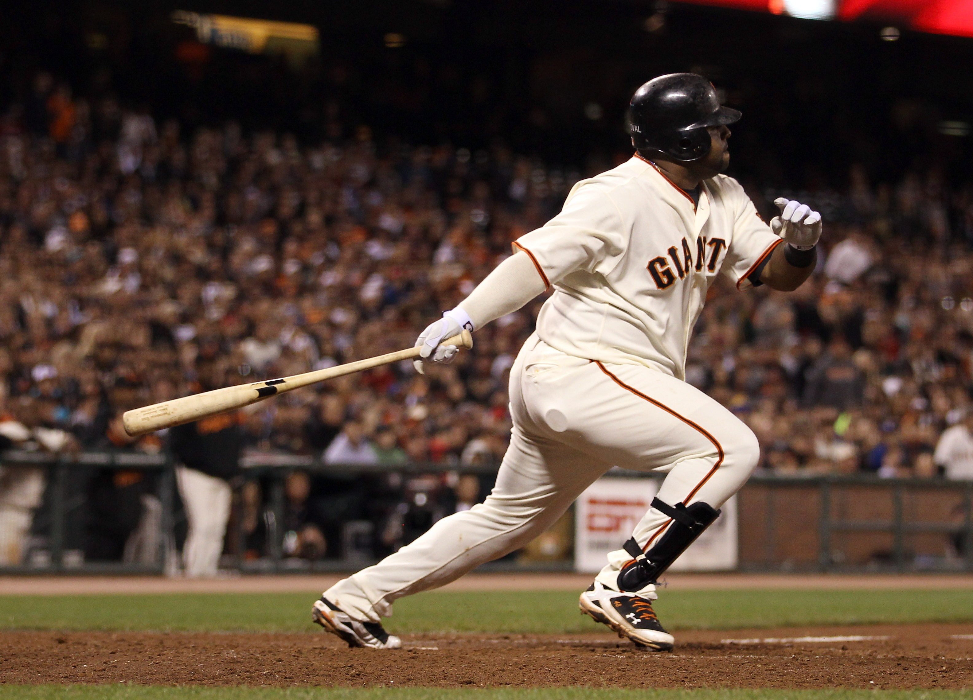 SAN FRANCISCO - SEPTEMBER 15:  Pablo Sandoval #38 of the San Francisco Giants hits a fielders choice that scored Aubrey Huff #17 to give the Giants a 2-0 lead over the Los Angeles Dodgers in the eighth inning at AT&T Park on September 15, 2010 in San Fran