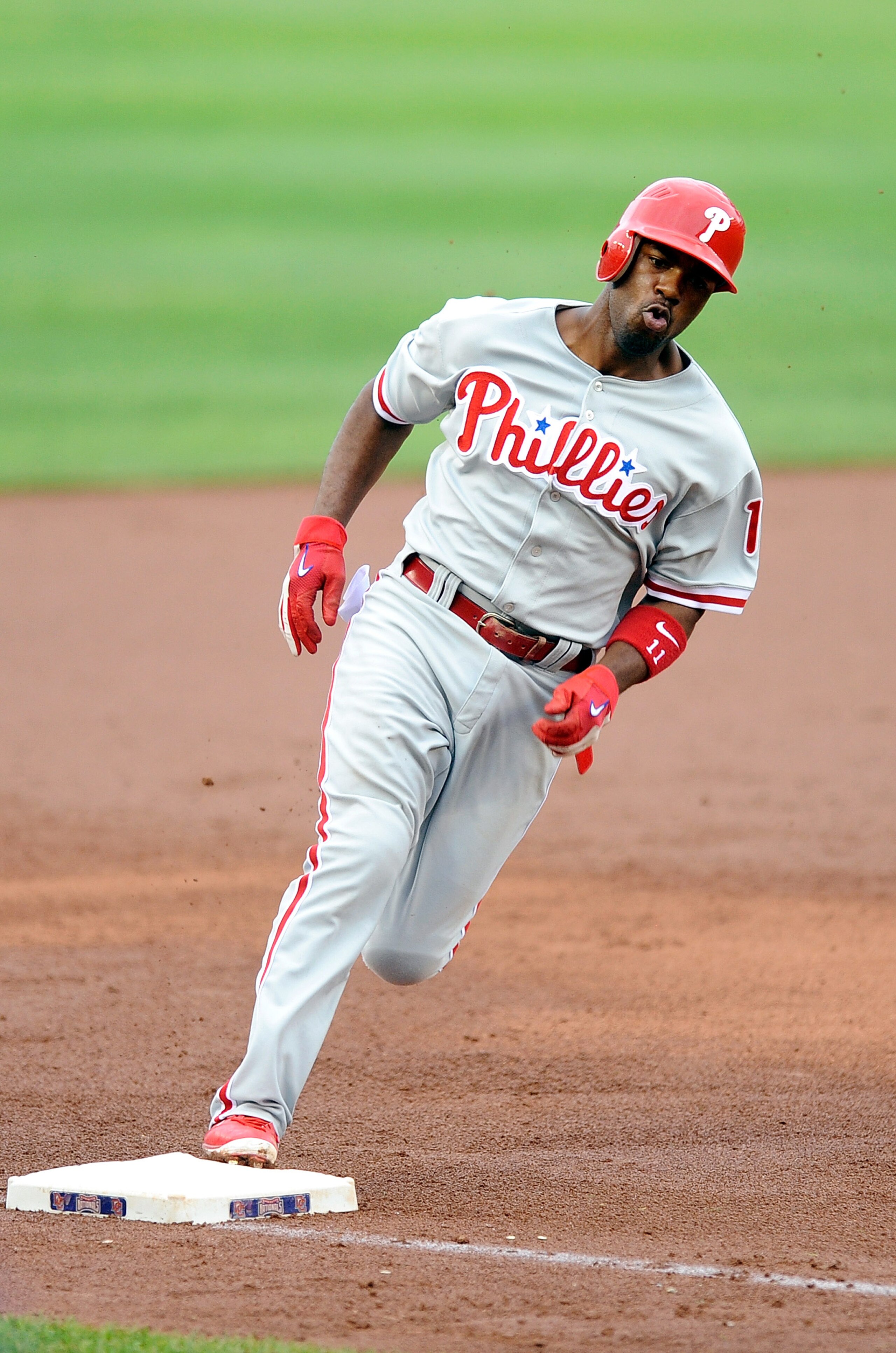 WASHINGTON - AUGUST 01:  Jimmy Rollins #11 of the Philadelphia Phillies rounds third base and scores in the seventh inning against the Washington Nationals at Nationals Park on August 1, 2010 in Washington, DC.  (Photo by Greg Fiume/Getty Images)