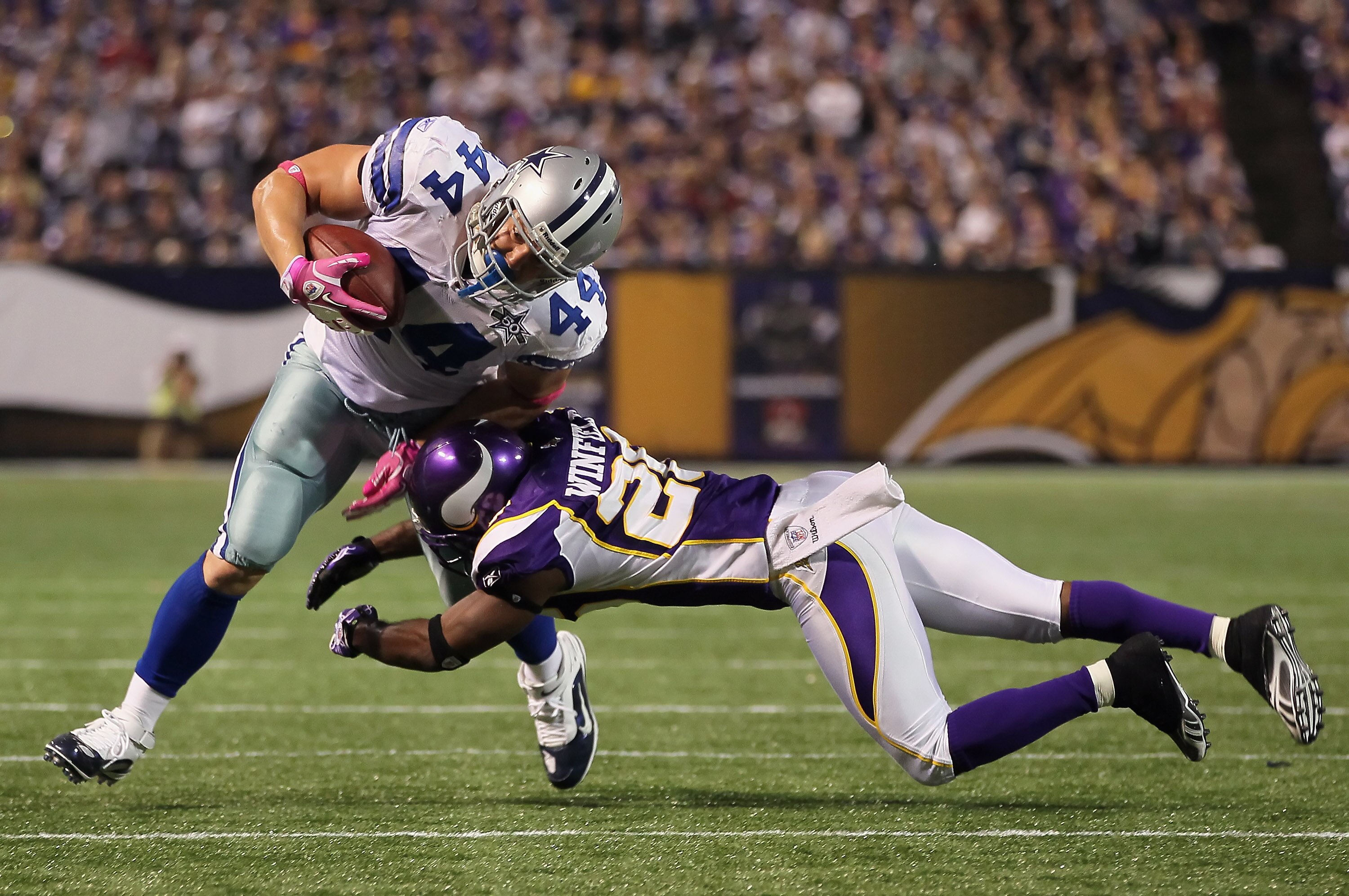 MINNEAPOLIS - OCTOBER 17: Fullback Chris Gronkowski #44 of the Dallas Cowboys is hit by Antoine Winfield #26 of the Minnesota Vikings during the second quarter at Mall of America Field on October 17, 2010 in Minneapolis, Minnesota. The Vikings defeated t MINNEAPOLIS - OCTOBER 17: Fullback Chris Gronkowski #44 of the Dallas Cowboys is hit by Antoine Winfield #26 of the Minnesota Vikings during the second quarter at Mall of America Field on October 17, 2010 in Minneapolis, Minnesota. The Vikings defeated t