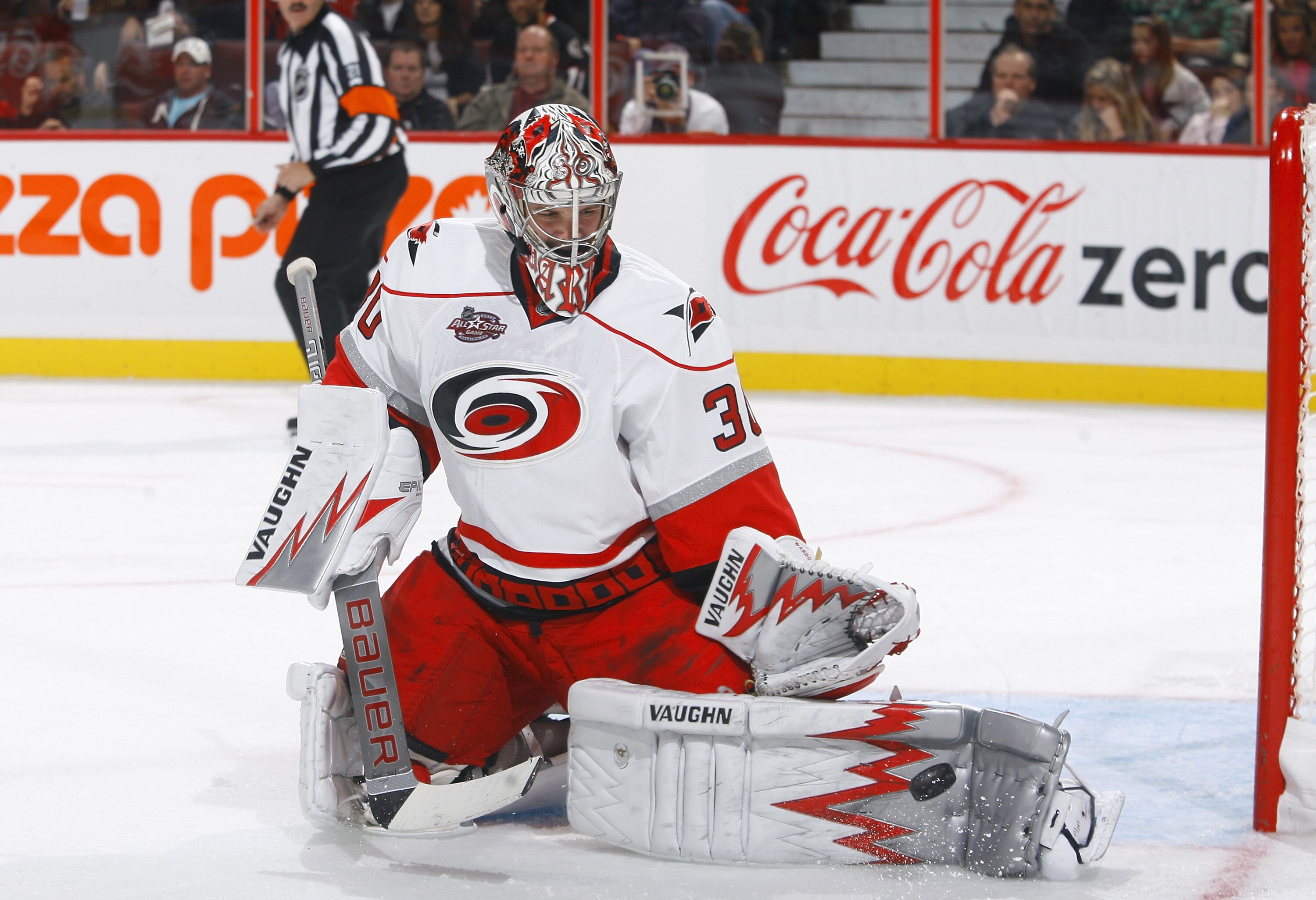 OTTAWA, ON - OCTOBER 14:  Cam Ward #30 of the Carolina Hurricanes makes a pad save down low against the Ottawa Senators during a game at Scotiabank Place on October 14, 2010 in Ottawa, Ontario, Canada.  (Photo by Phillip MacCallum/Getty Images)