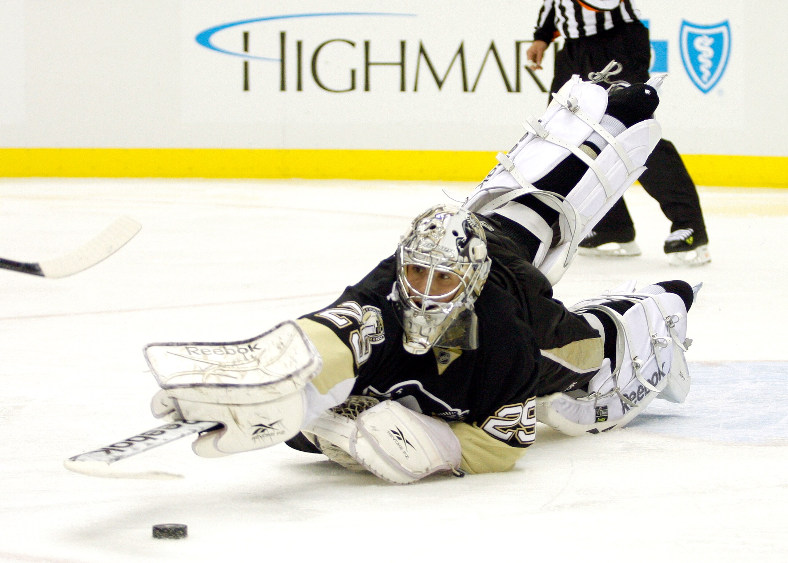 PITTSBURGH - OCTOBER 9:  Marc-Andre Fleury #29 of the Pittsburgh Penguins makes a diving save against the Montreal Canadiens at Consol Energy Center on October 9, 2010 in Pittsburgh, Pennsylvania.  (Photo by Justin K. Aller/Getty Images)