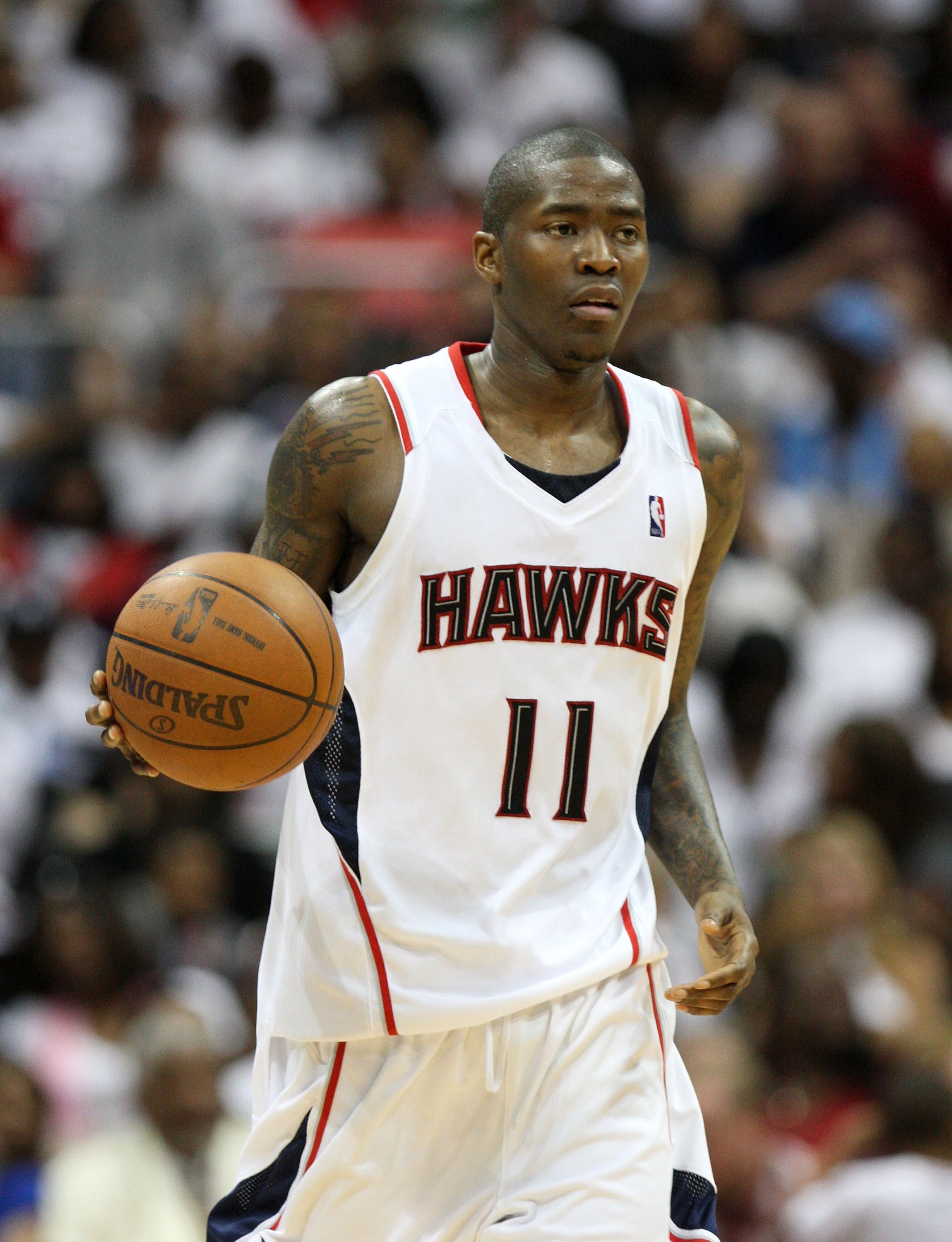 ATLANTA - MAY 2:  Guard Jamal Crawford #11 of the Atlanta Hawks dribbles the ball during Game Seven of the Eastern Conference Quarterfinals between the Milwaukee Bucks and the Atlanta Hawks during the 2010 NBA Playoffs at Philips Arena on May 2, 2010 in A